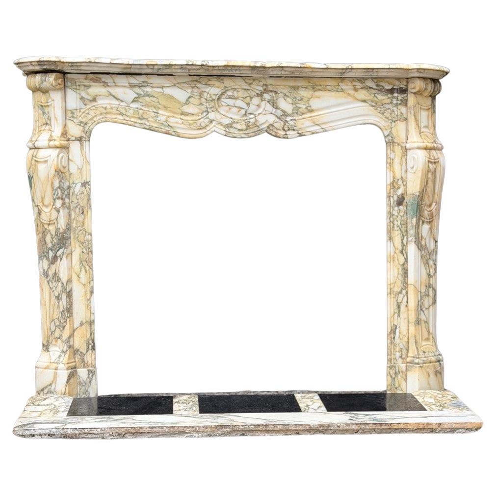 Louis XV style fireplace in purple breccia marble, circa 1880