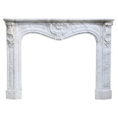 Antique Louis XV Style Fireplace of Carrara Marble from the 19th Century