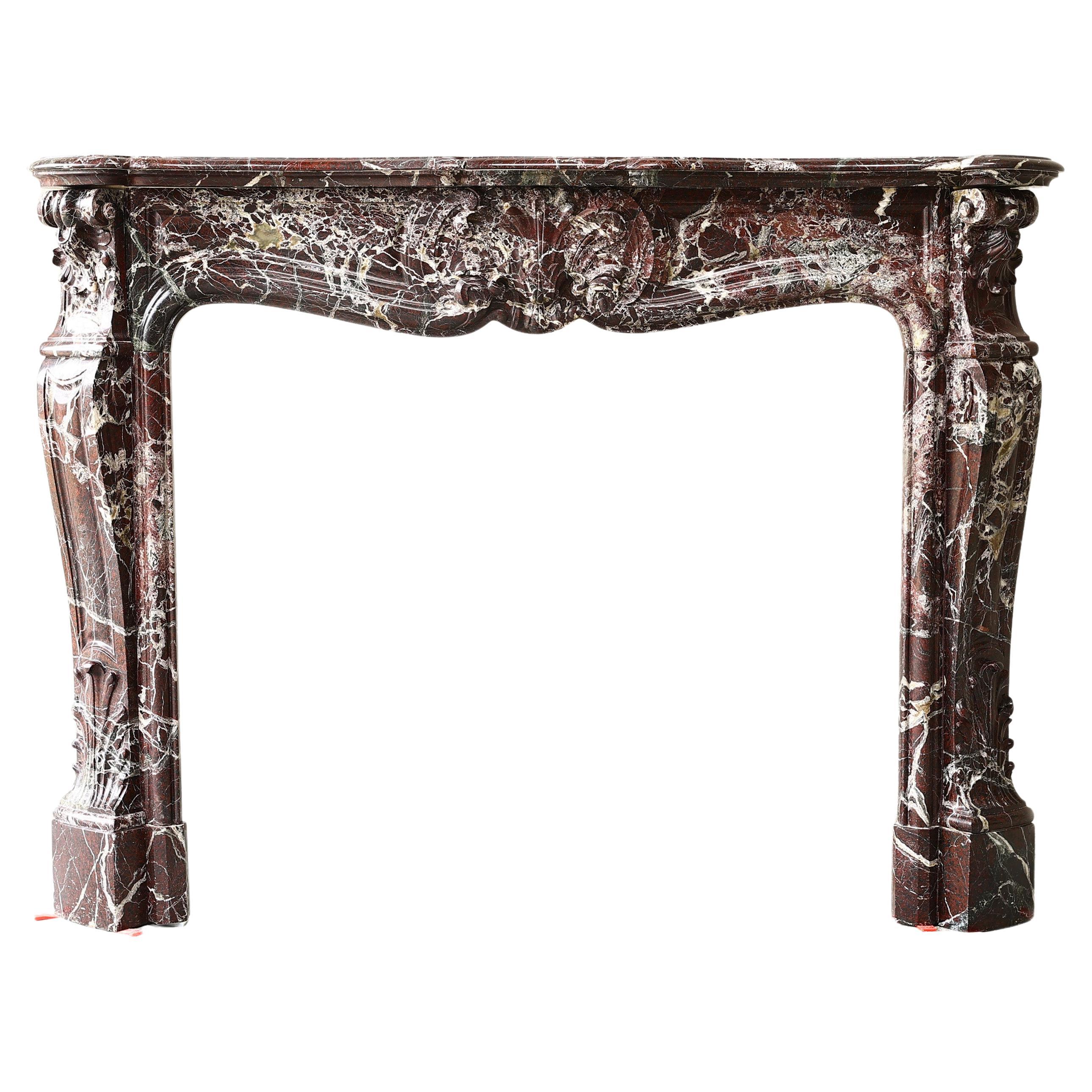 Louis XV style fireplace of Levanto marble from the 19th century For Sale