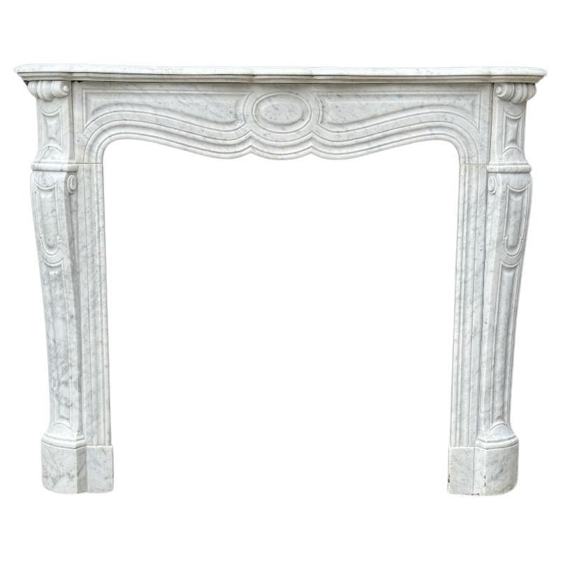 Louis XV Style Fireplace, Pompadour Model In Carrara Marble, Circa 1900 For Sale