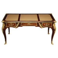 Louis XV style flat desk in marquetry and rich gilt bronze mounted