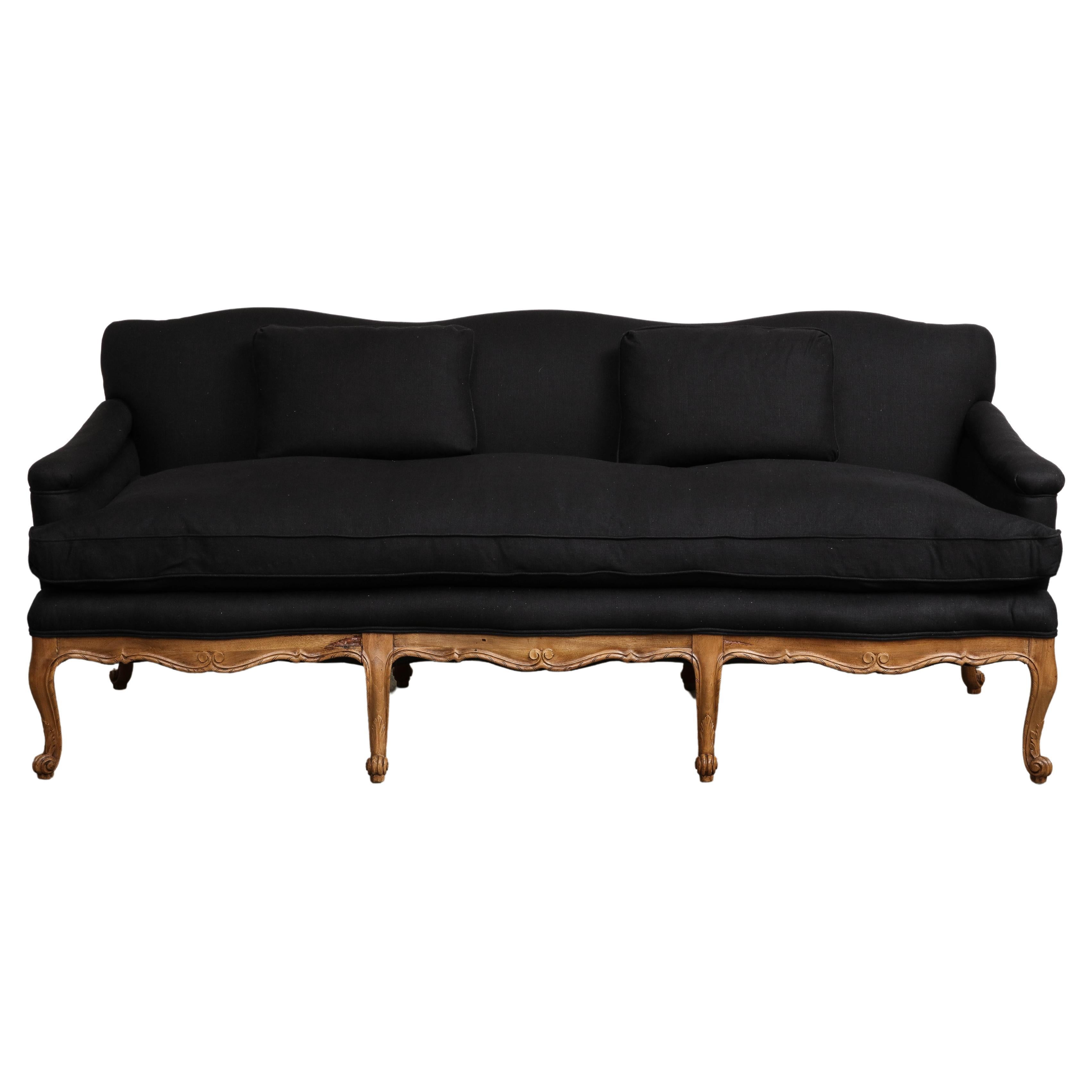 Louis XV Style French Carved Walnut and Black Linen Sofa