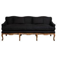 Antique Louis XV Style French Carved Walnut and Black Linen Sofa