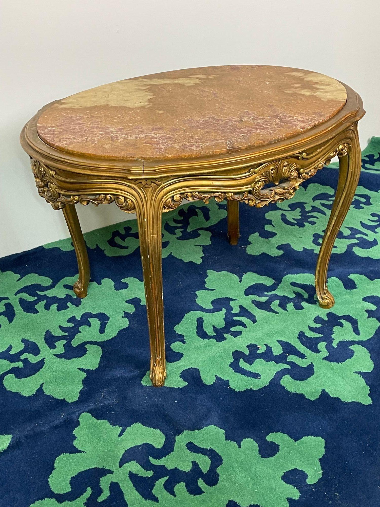 Louis XV Style French Center, End Table, Giltwood, Marble Top
A giltwood center or side table in the Louis XV style.  Excellent scale for a vestibule or foyer, the slender and refined giltwood legs and turned feet support a carved apron and a