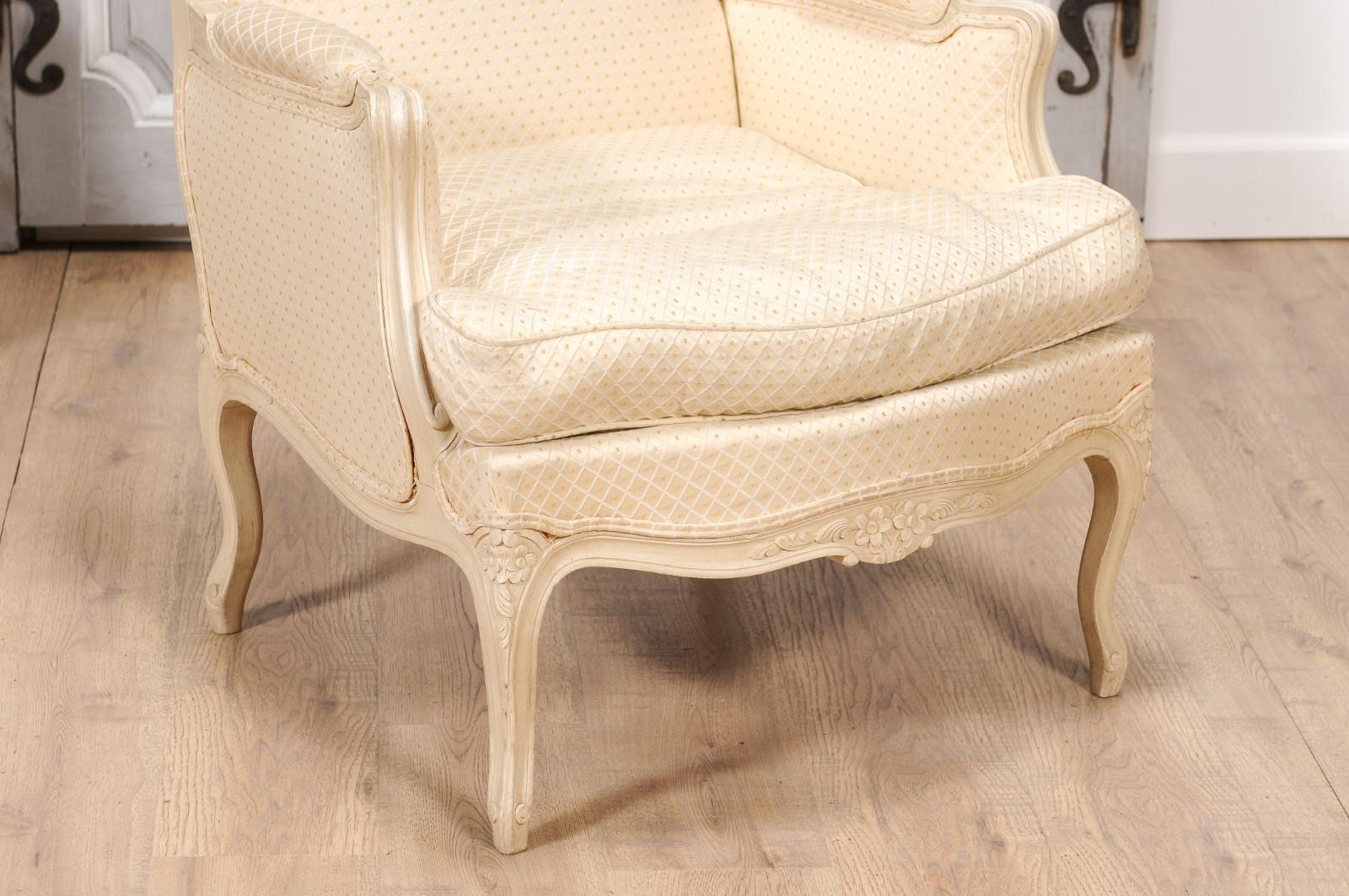 Louis XV Style French Cream Painted Wood Carved Bergères Chairs, a Pair In Good Condition In Atlanta, GA