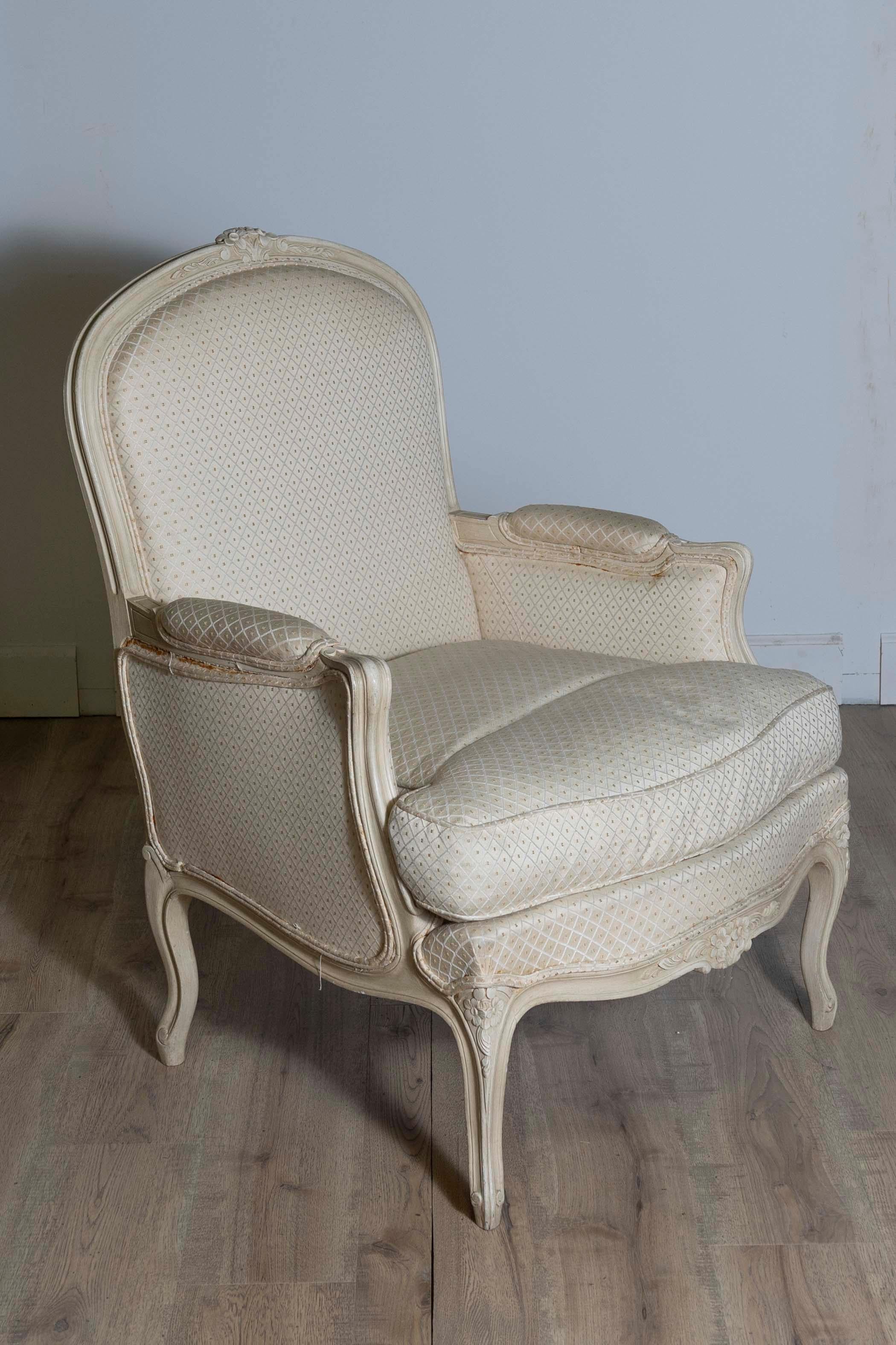 20th Century Louis XV Style French Cream Painted Wood Carved Bergères Chairs, a Pair For Sale