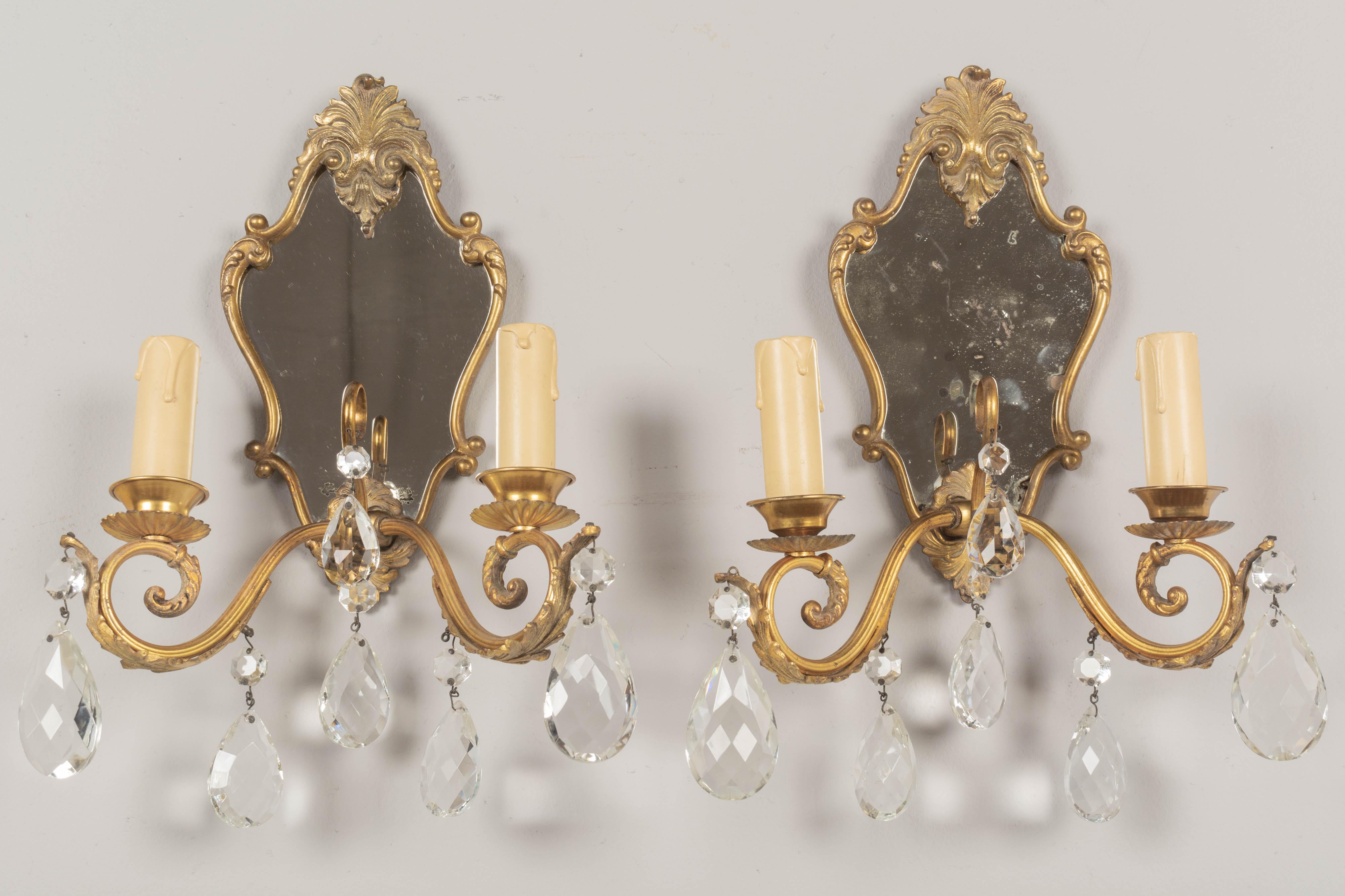 Cast Louis XV Style French Crystal and Brass Sconces, a Pair For Sale