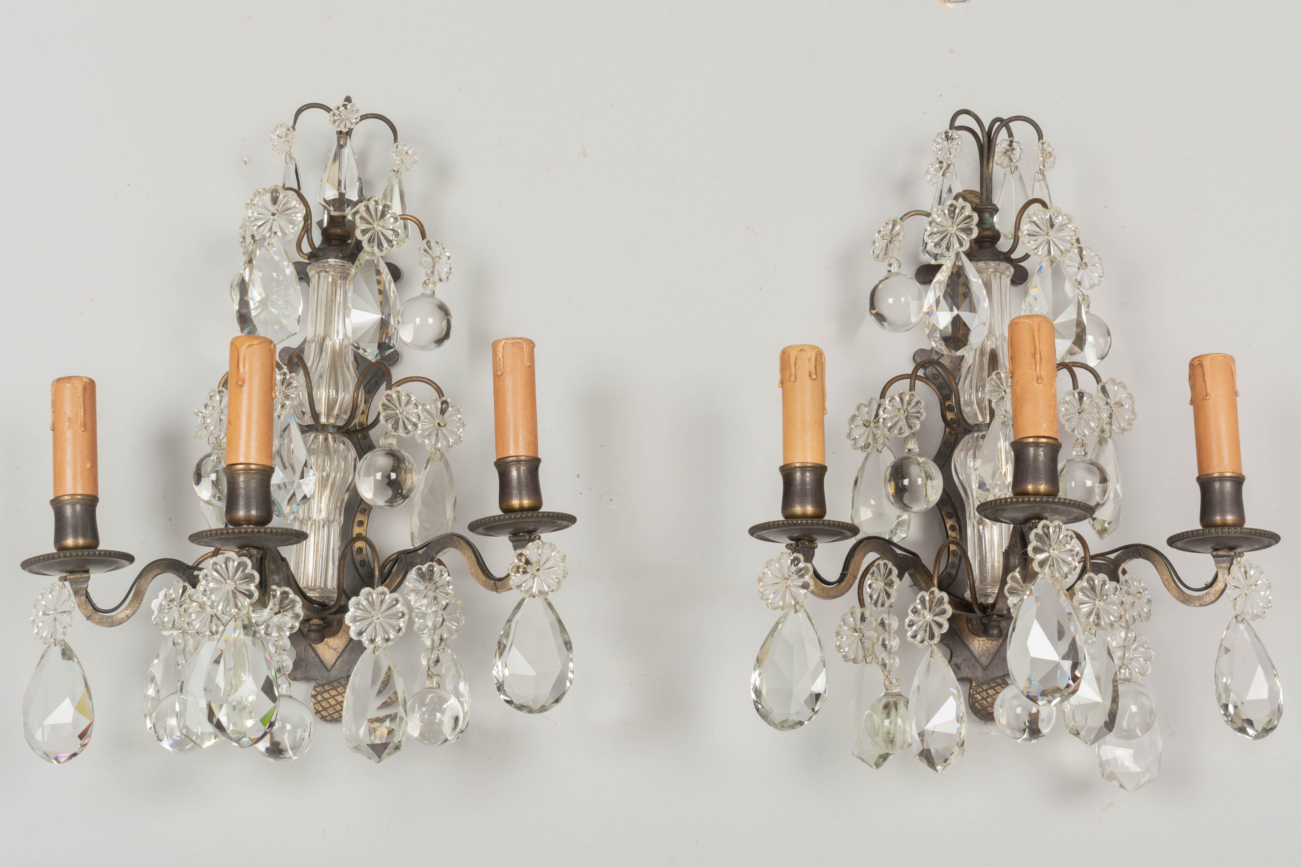 Cast Louis XV Style French Crystal and Brass Sconces, a Pair For Sale