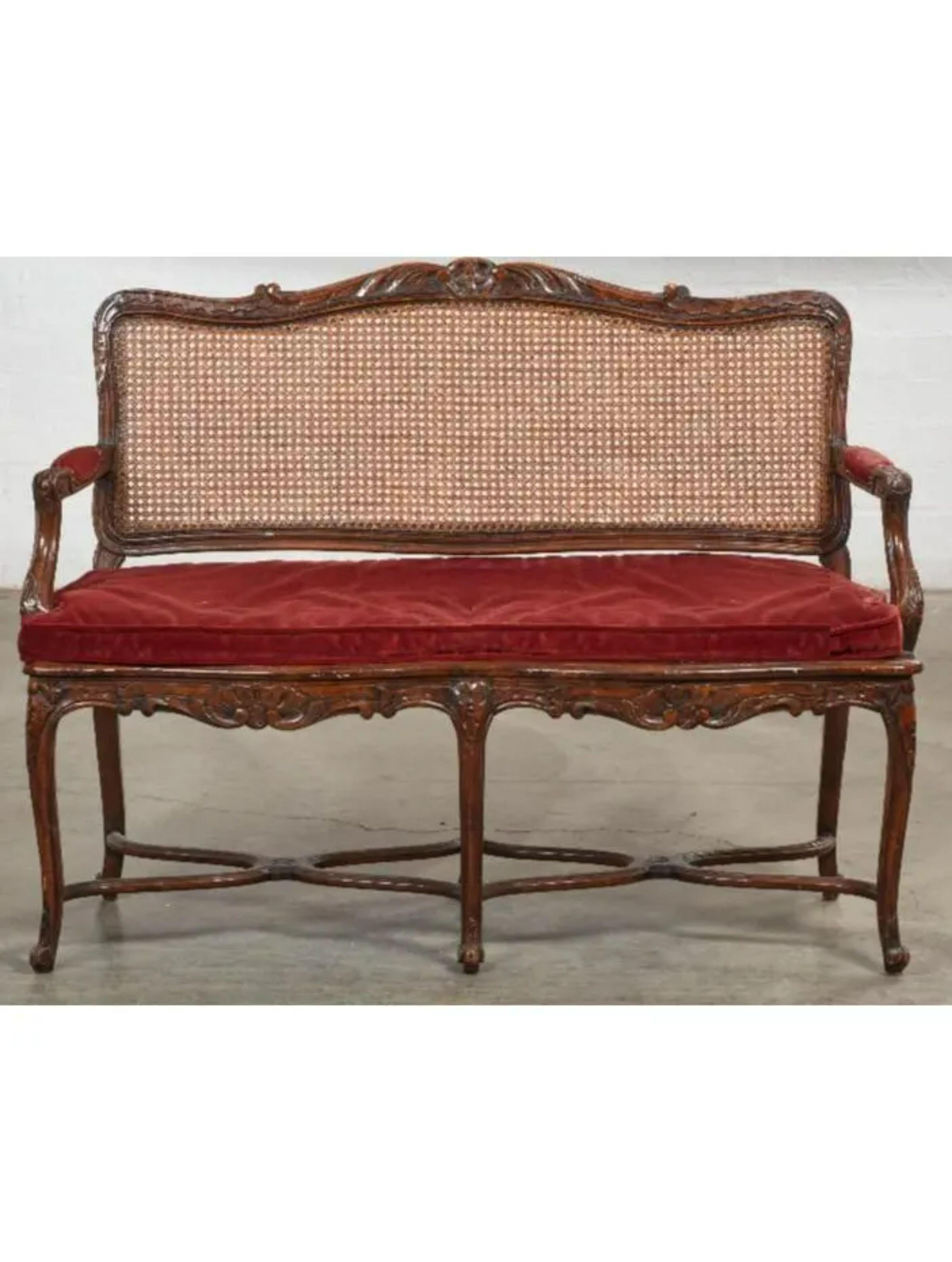 20th Century Louis XV Style French Provincial Carved Walnut & Cane Seat Settee
