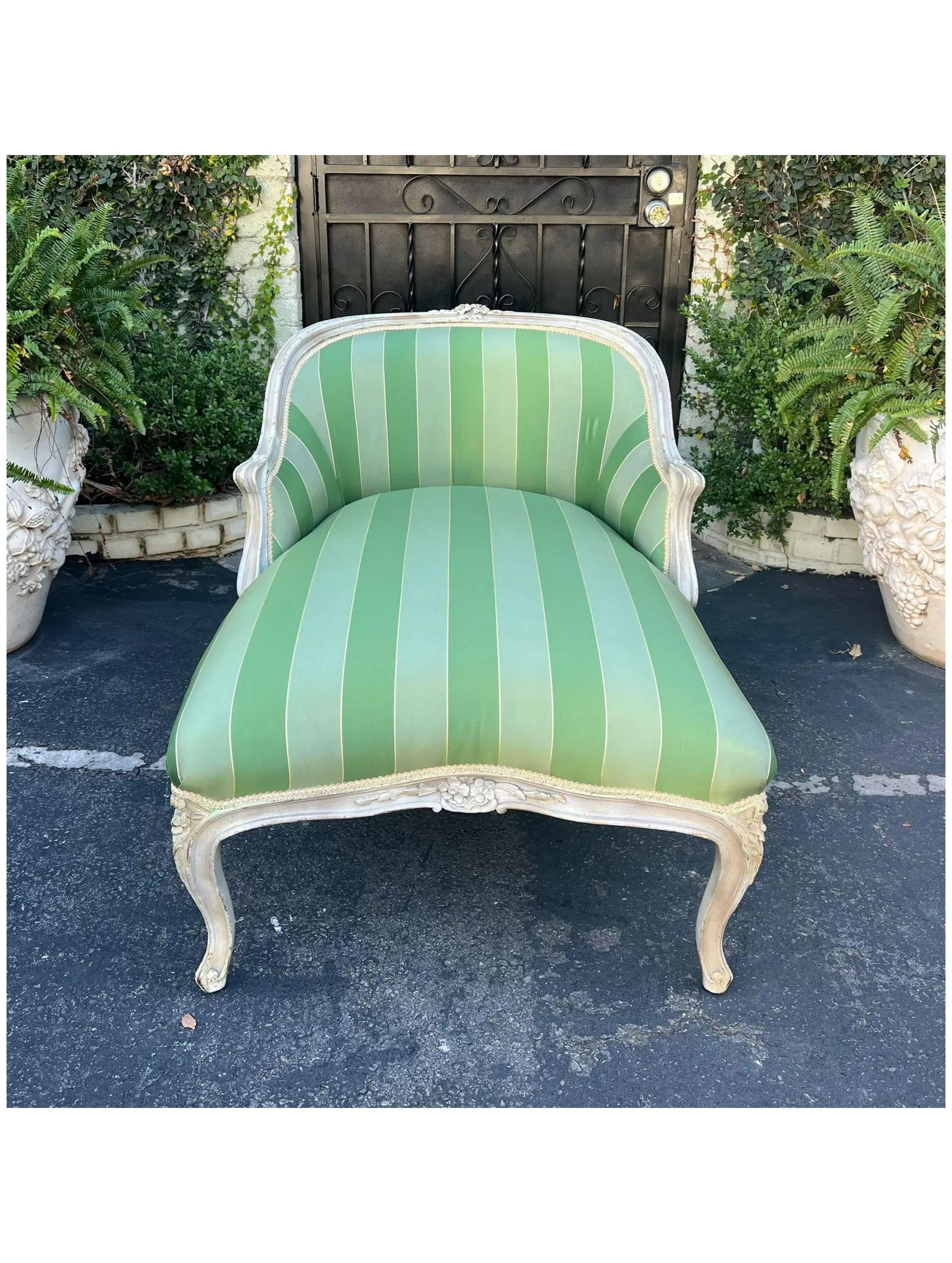 Louis XV Style French Striped Chaise Lounge. It has been freshly upholstered in expensive green striped fabric and it’s super comfortable.

Additional information: 
Materials: Cotton, Silk, Wood
Color: Green
Period: 19th century
Styles: Louis