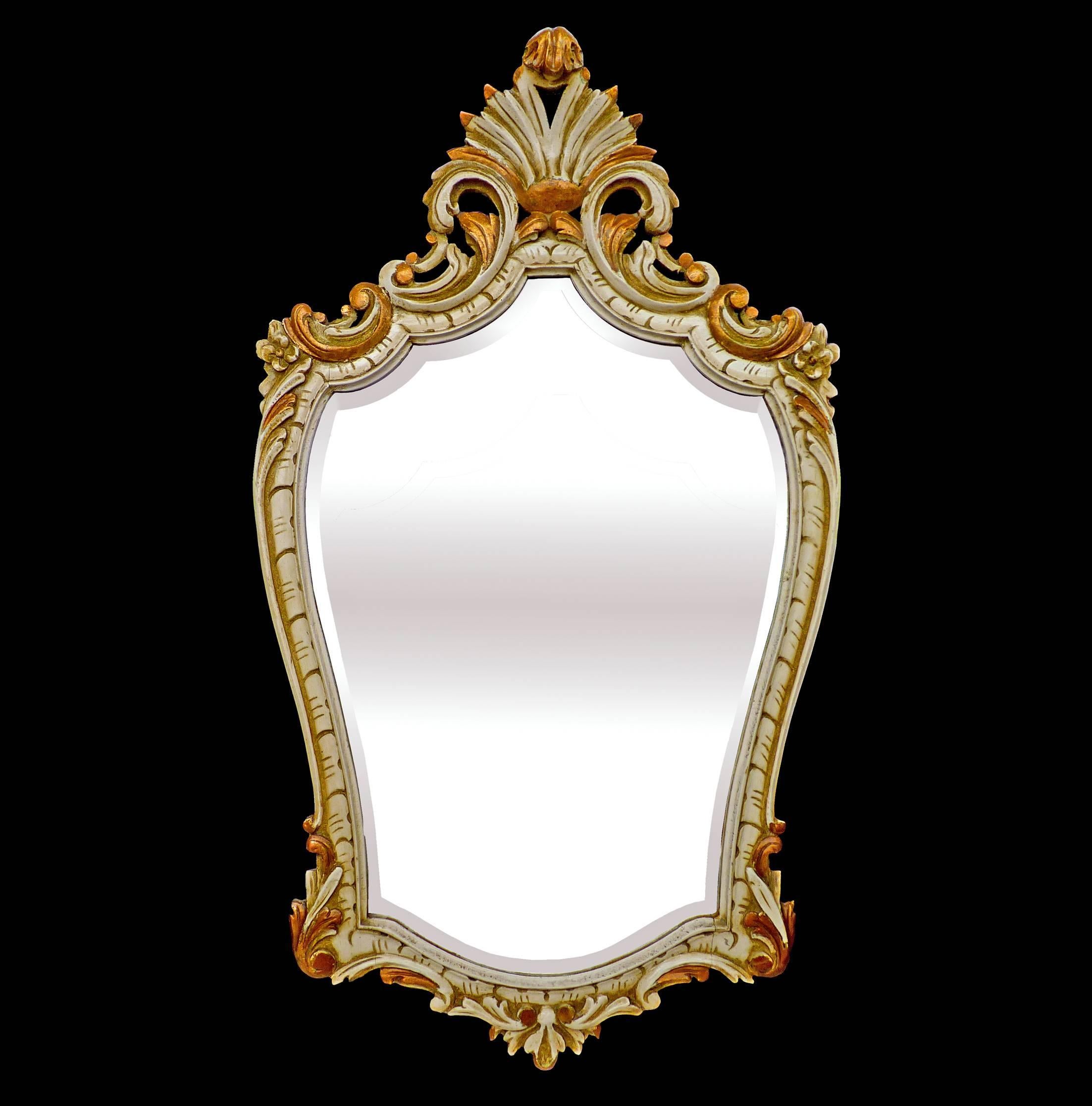 Antique Louis XV style gilded and painted wood mirror with hand carved shell and floral elements
beveled mirror

Measures:
Width 22 in / 56 cm
Height 40 in / 100 cm
Weight 11 lb. (5.5 kg).
