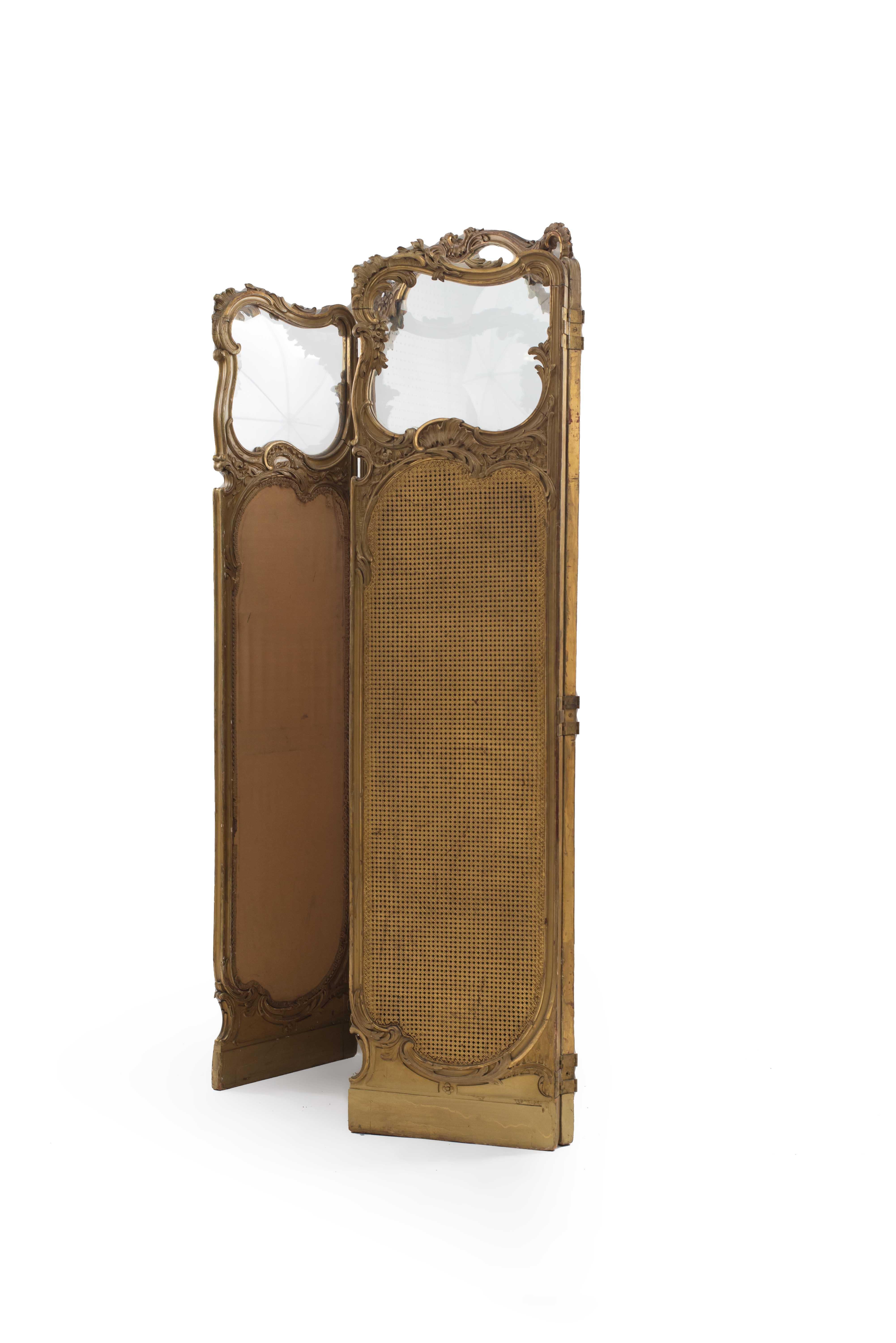 French Louis XV style (19th Century) gilt 3 fold screen with glass top panels and cane bottom-panels.
 