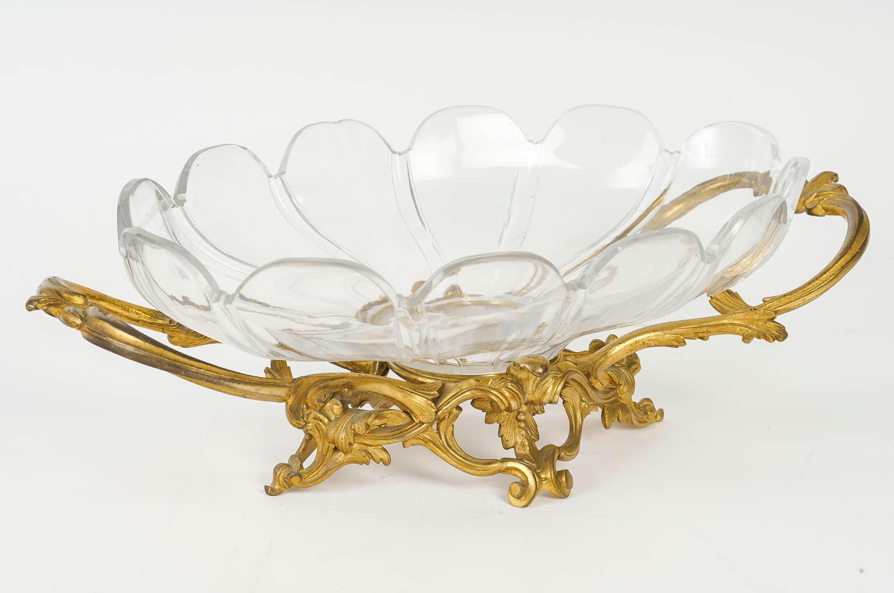 Louis XV style gilt bronze and crystal bowl, Napoleon III period.

A Napoleon III period gilt bronze and crystal bowl in the Louis XV style.
h: 14cm, w: 44cm, d: 23.5cm