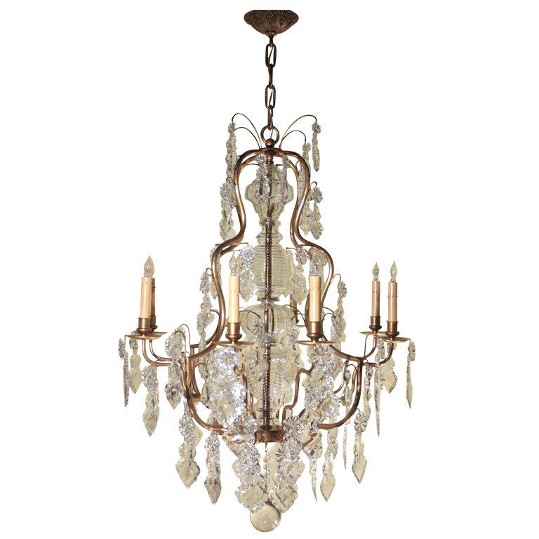 Lustre de style Louis XV en bronze doré et cristal