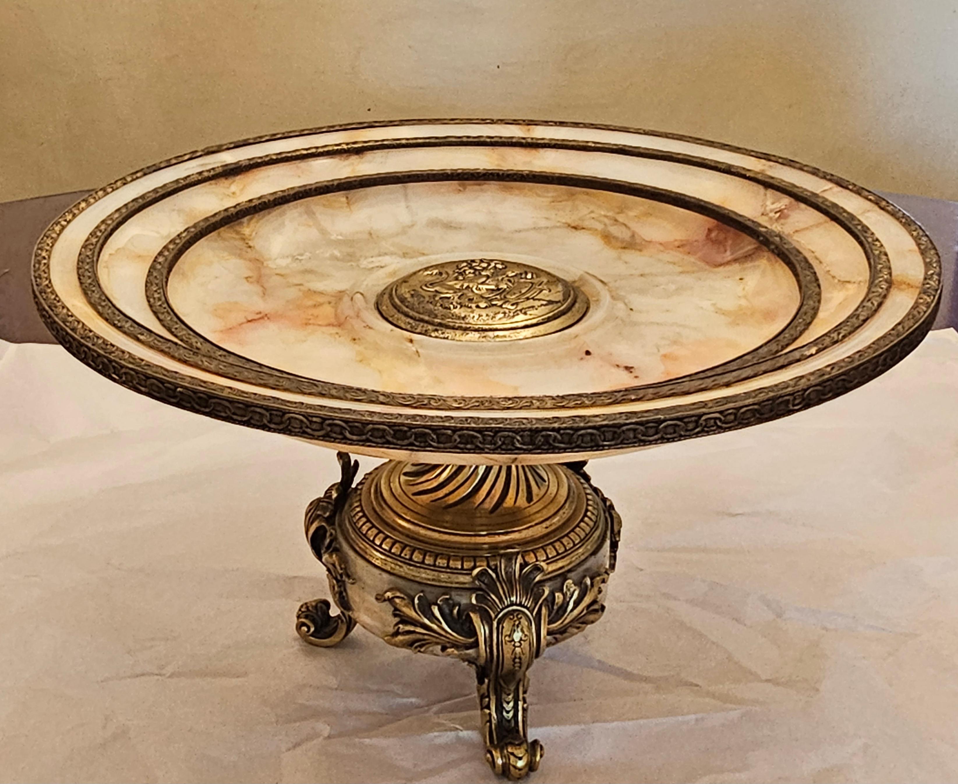 An early 20th century Louis XV Style bronze and marble centerpiece / epergne in very good condition. Measures 15.25