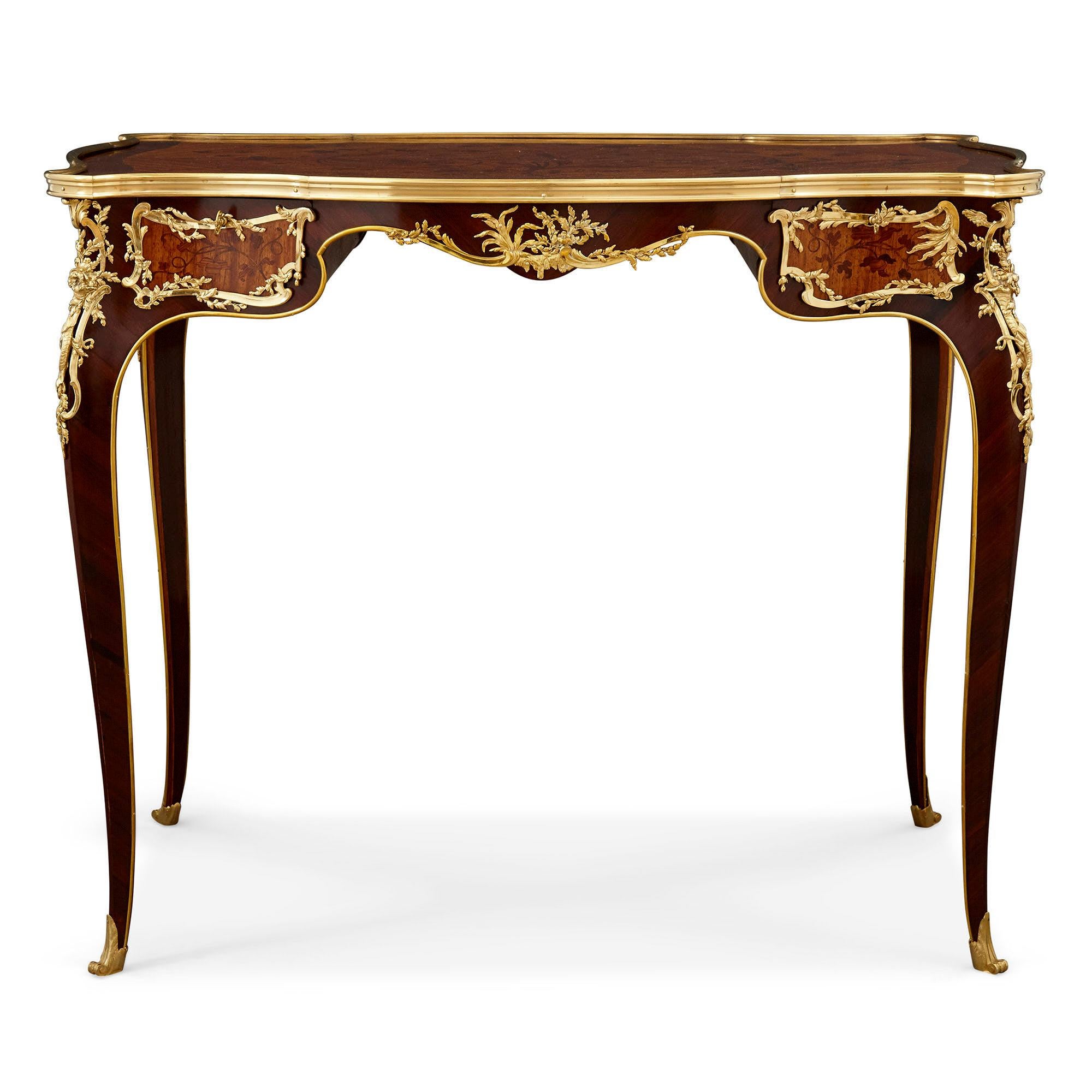 Louis XV style gilt bronze and marquetry desk attributed to Zwiener
French, late 19th century
Measures: Height 74cm, width 89cm, depth 63cm

This superb little writing desk is attributed to the important furniture maker Joseph-Emmanuel Zwiener.