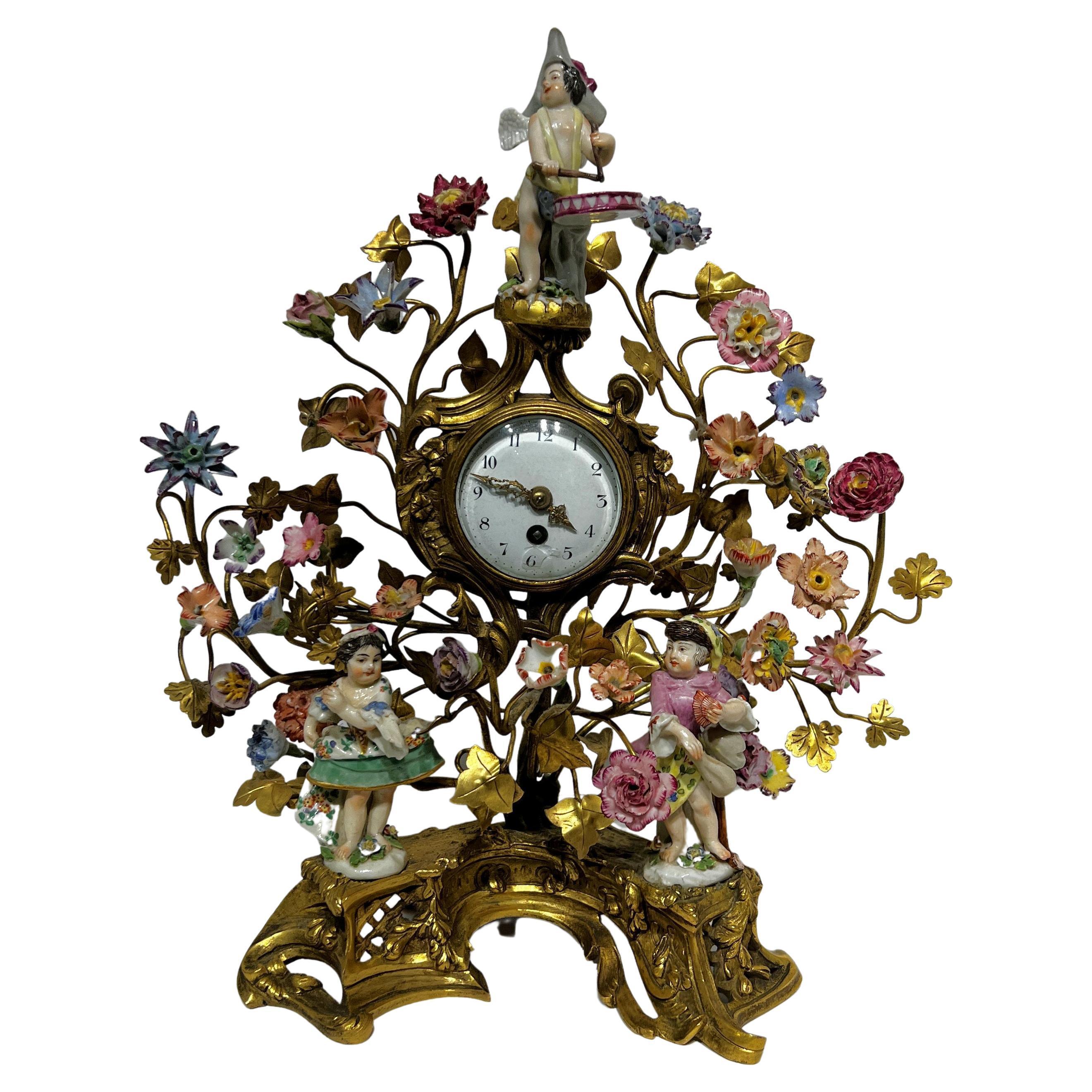 Very fine quality French 19 century Louis XV style gilt bronze and porcelain Figurative Clock.
With porcelain figures and flowers.