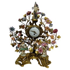 Louis XV Style Gilt Bronze and Porcelain Figurative Clock