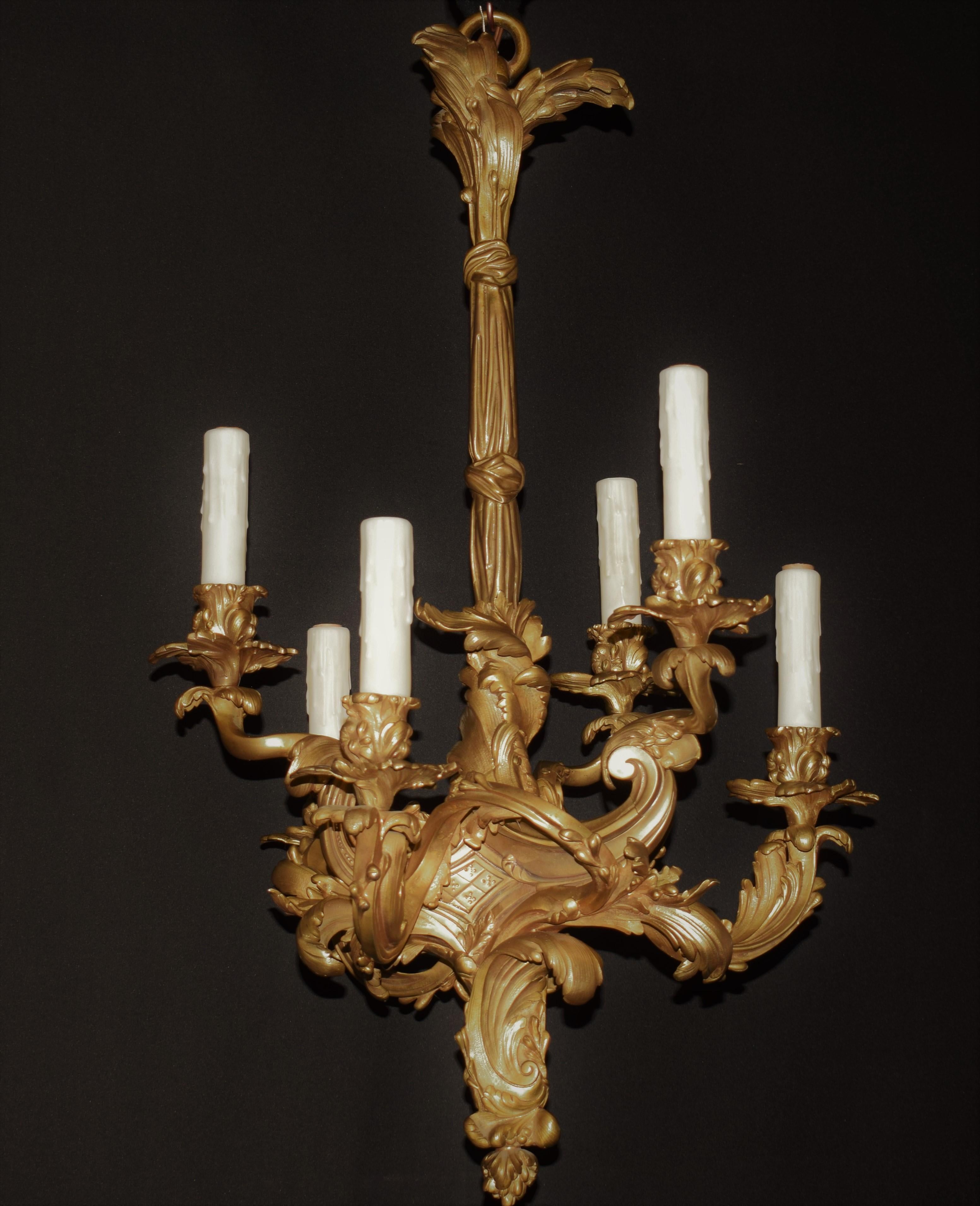 Louis XV style gilt bronze chandelier. A very fine gilt bronze chandelier in the Louis XV style.,
France, circa 1900. 6 lights.
Dimensions: Height 29