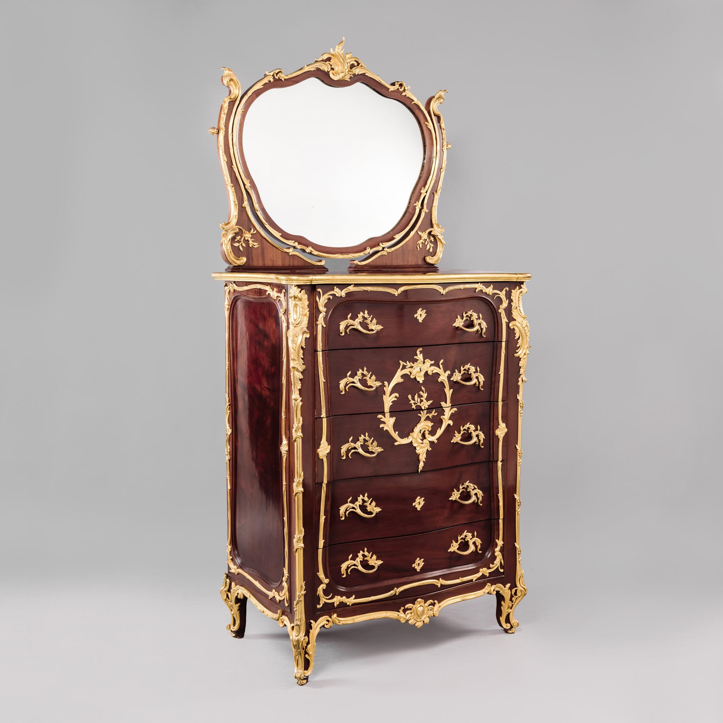 A Louis XV style gilt bronze mounted mahogany Coiffeuse attributed to François Linke. 

French, circa 1910. 

François Linke (1855 - 1946) was the most important Parisian cabinet maker of the late 19th and early 20th centuries, and possibly the