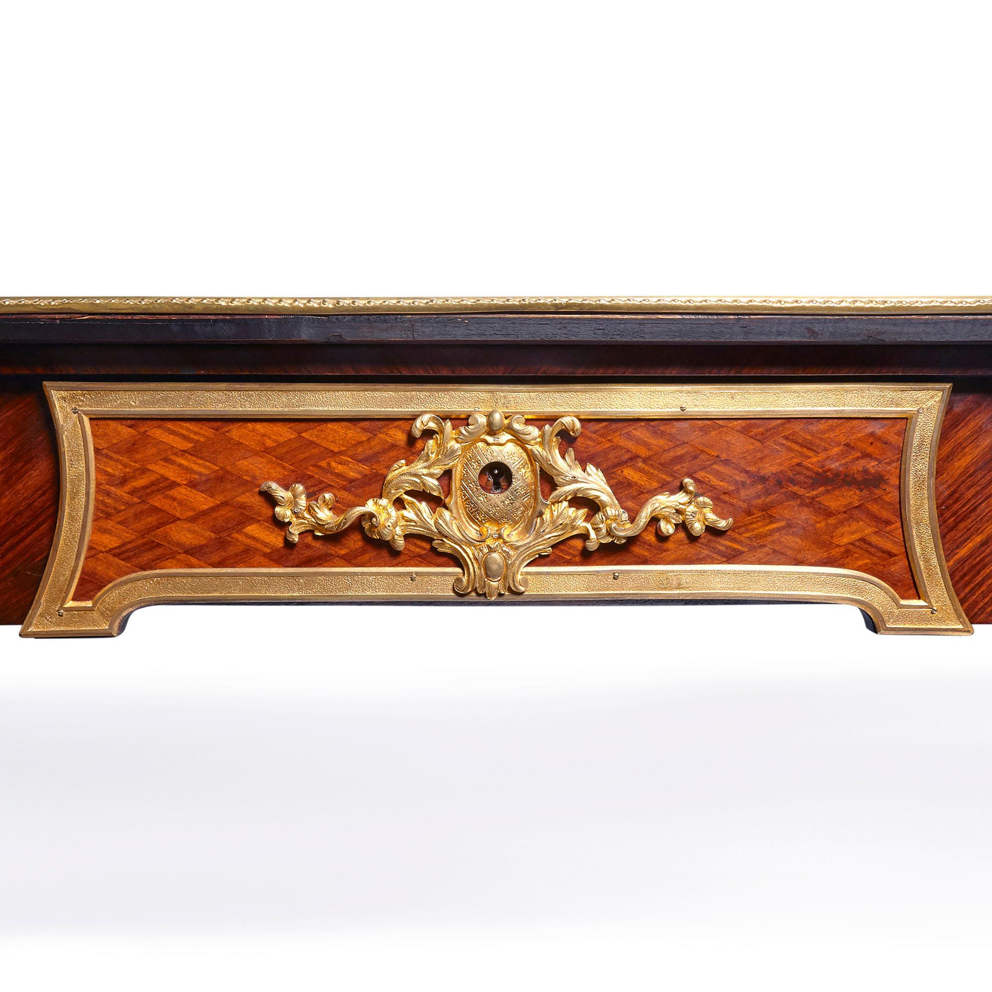 Louis XV style gilt bronze mounted writing desk by Poteau
French, late 19th century
Size: Height 78cm, width 180cm, depth 87cm

This beautiful Louis XV style writing desk is raised on four cabriole leg, each finished with a gilt bronze paw foot