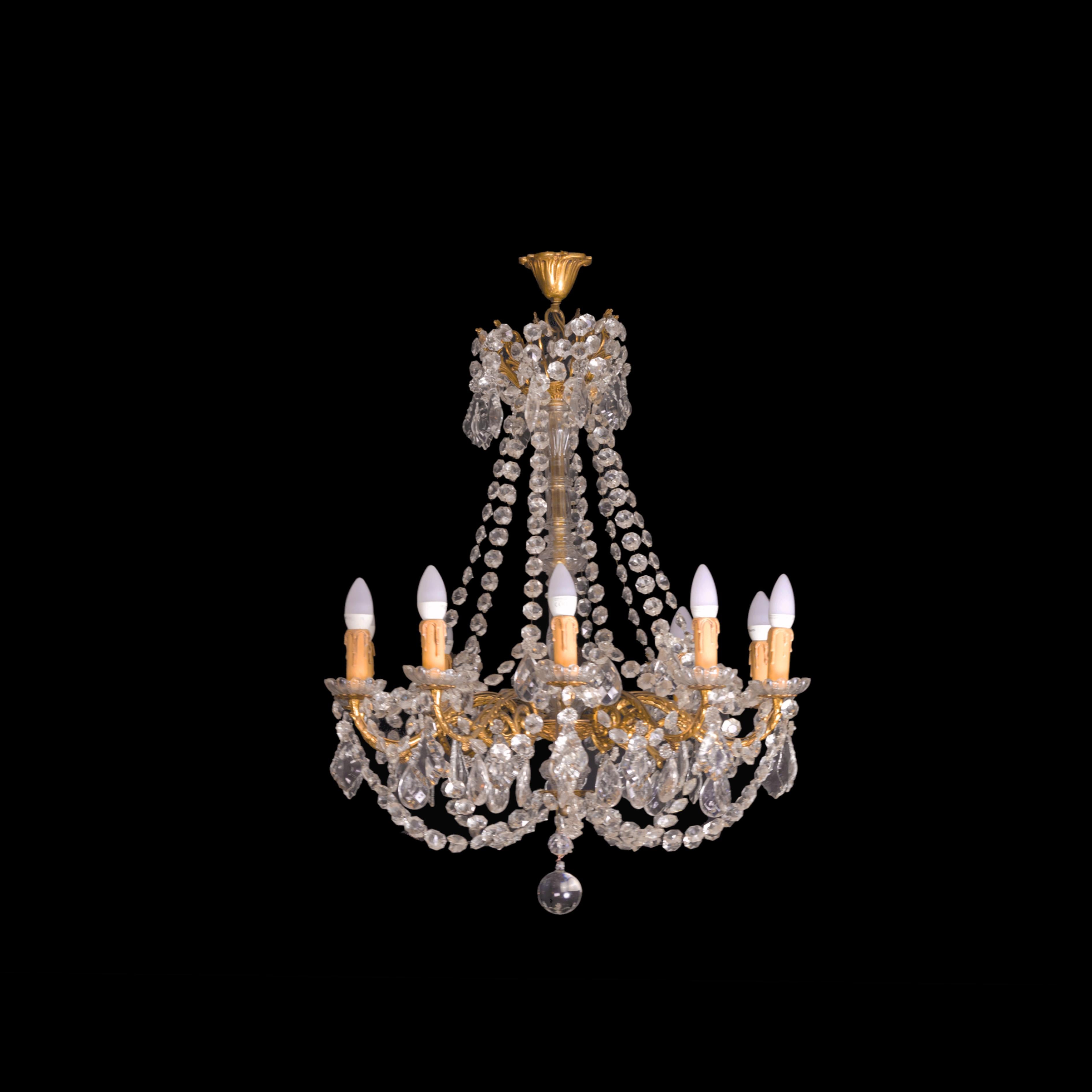 A gilt bronze Crystal and glass ceiling lamp in the Louis XV Style with ten arms. 
Recently rewired with ten illuminants. 
Ready to hang in your selling.

Take into account that the colors on the items may vary depending on the type of lighting and