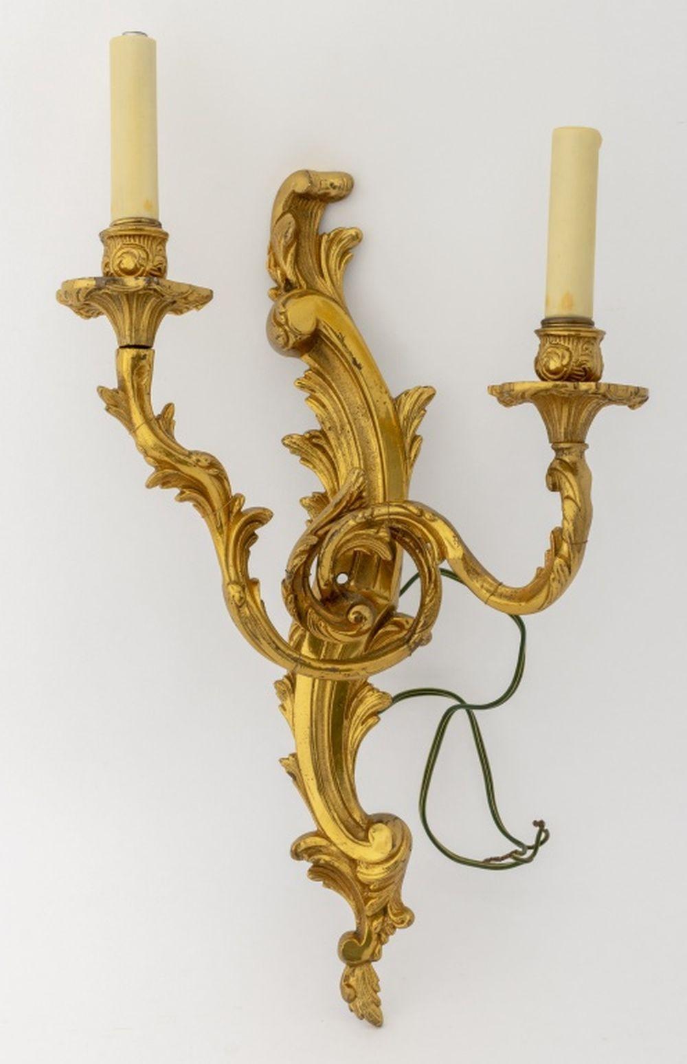 Pair of Louis XV Style Gilt Metal Two-Light Sconces, with foliate form arms. 19