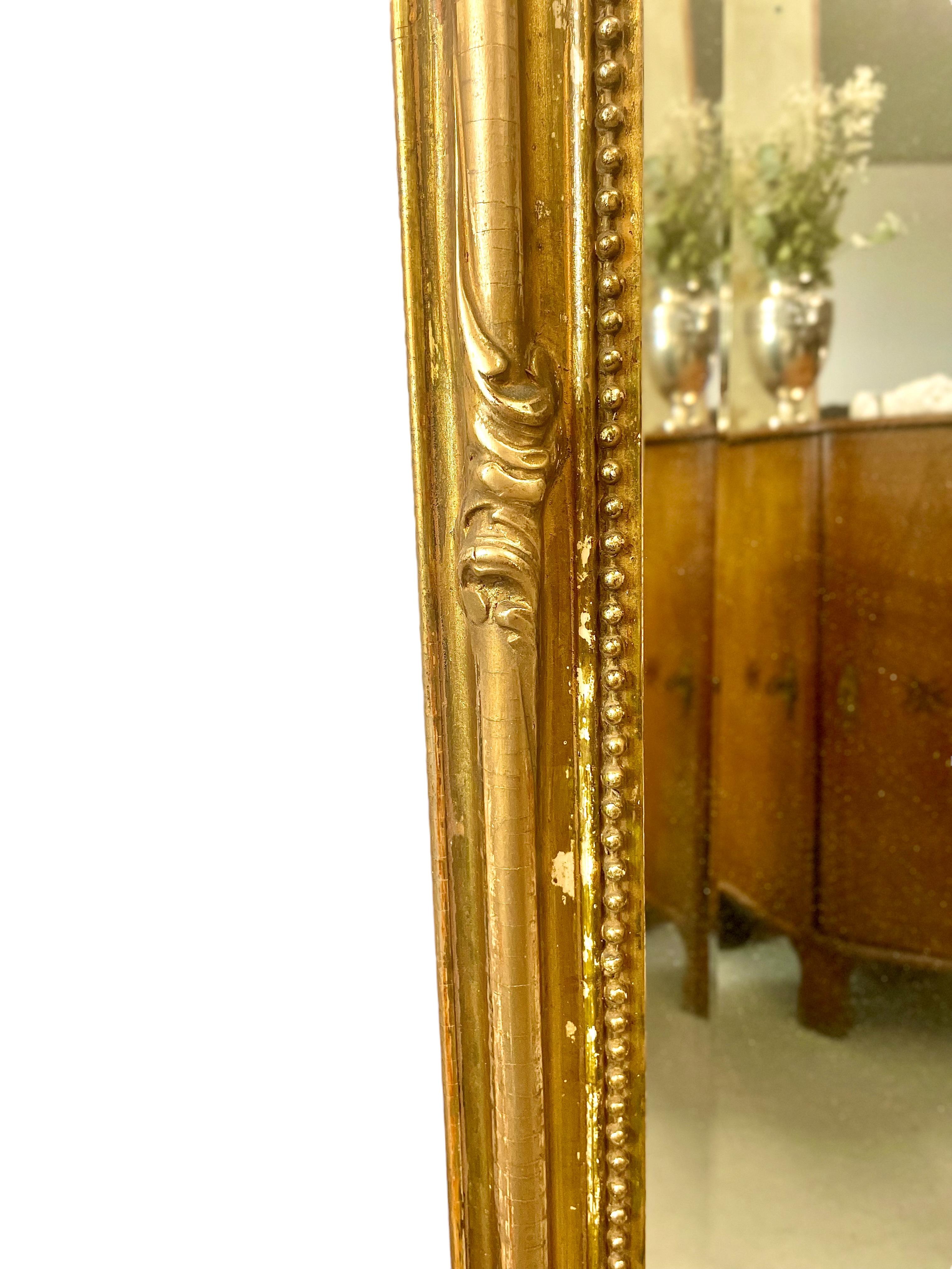 Stucco Louis XV Style Gilt Overmantel Mirror with Bevelled Glass Plate For Sale