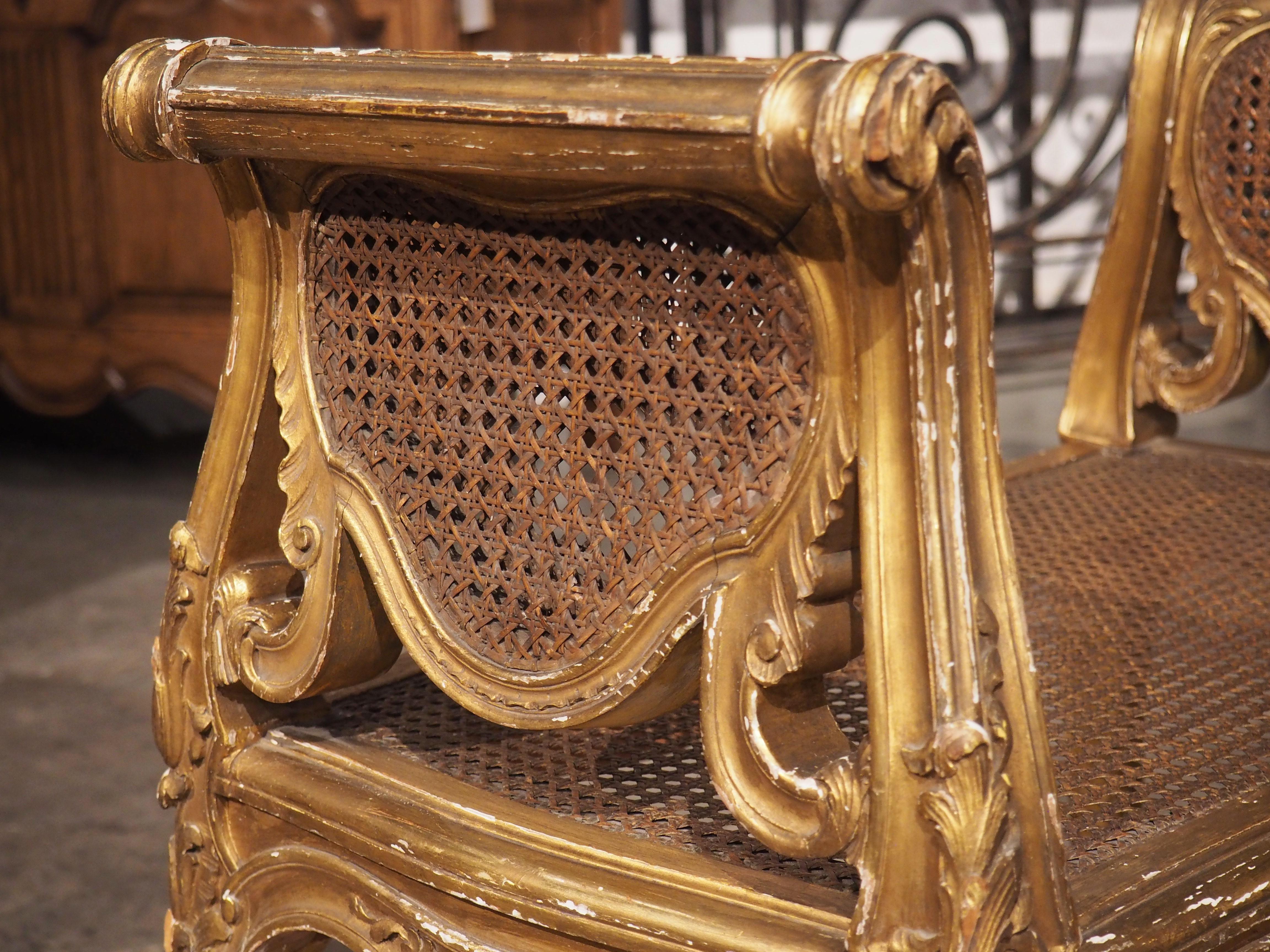 French Louis XV Style Giltwood and Caned Banquette from France, circa 1850