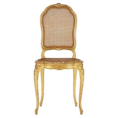 Chaise en bois doré de style Louis XV, 19e siècle.
