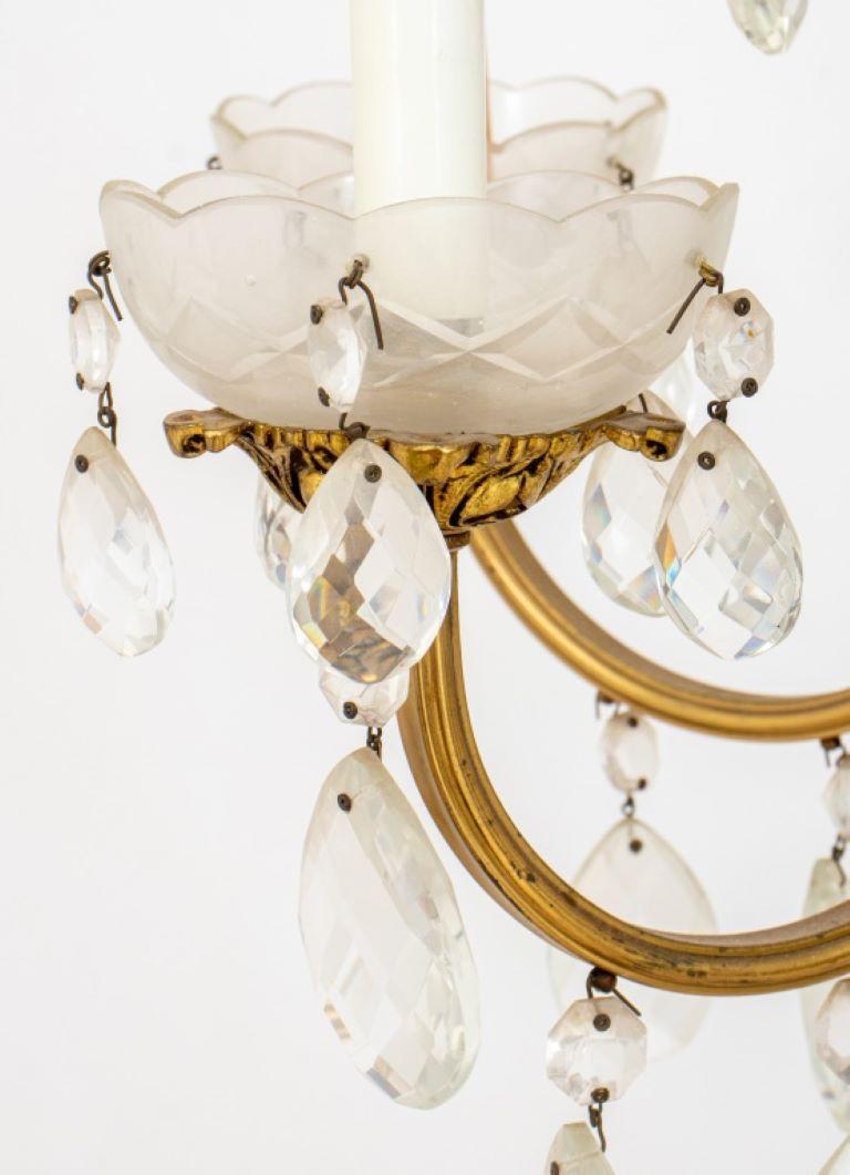 Louis XV style glass baluster-form six-light chandelier, the central etched glass covered baluster upright issuing six scrolling foliate arms hung with drops, and six curved candle arms with cut glass bobeches.

Dealer: S138XX
