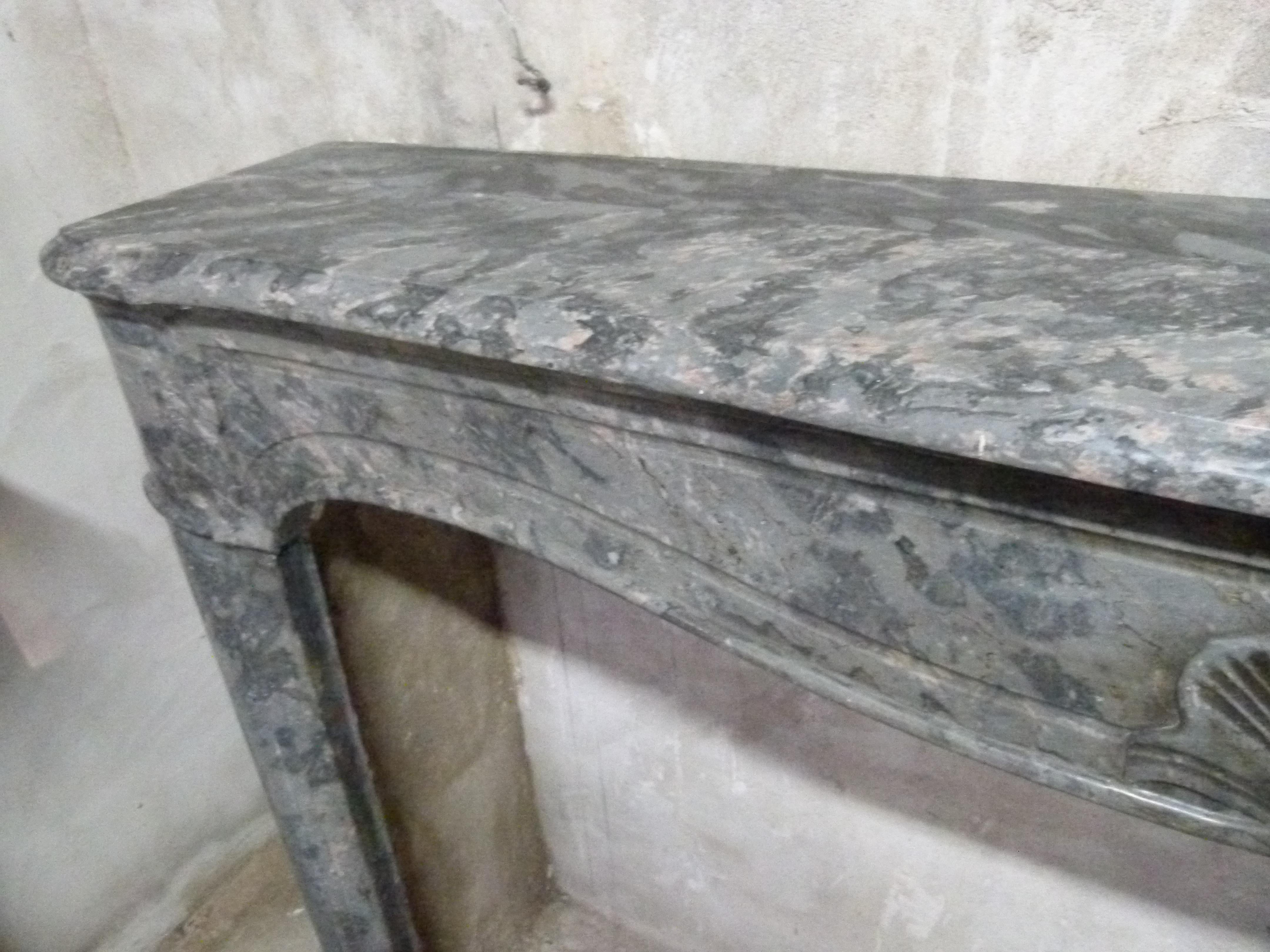 Hand-Carved Louis XV Style Grey Marble Fire Place Mantel For Sale
