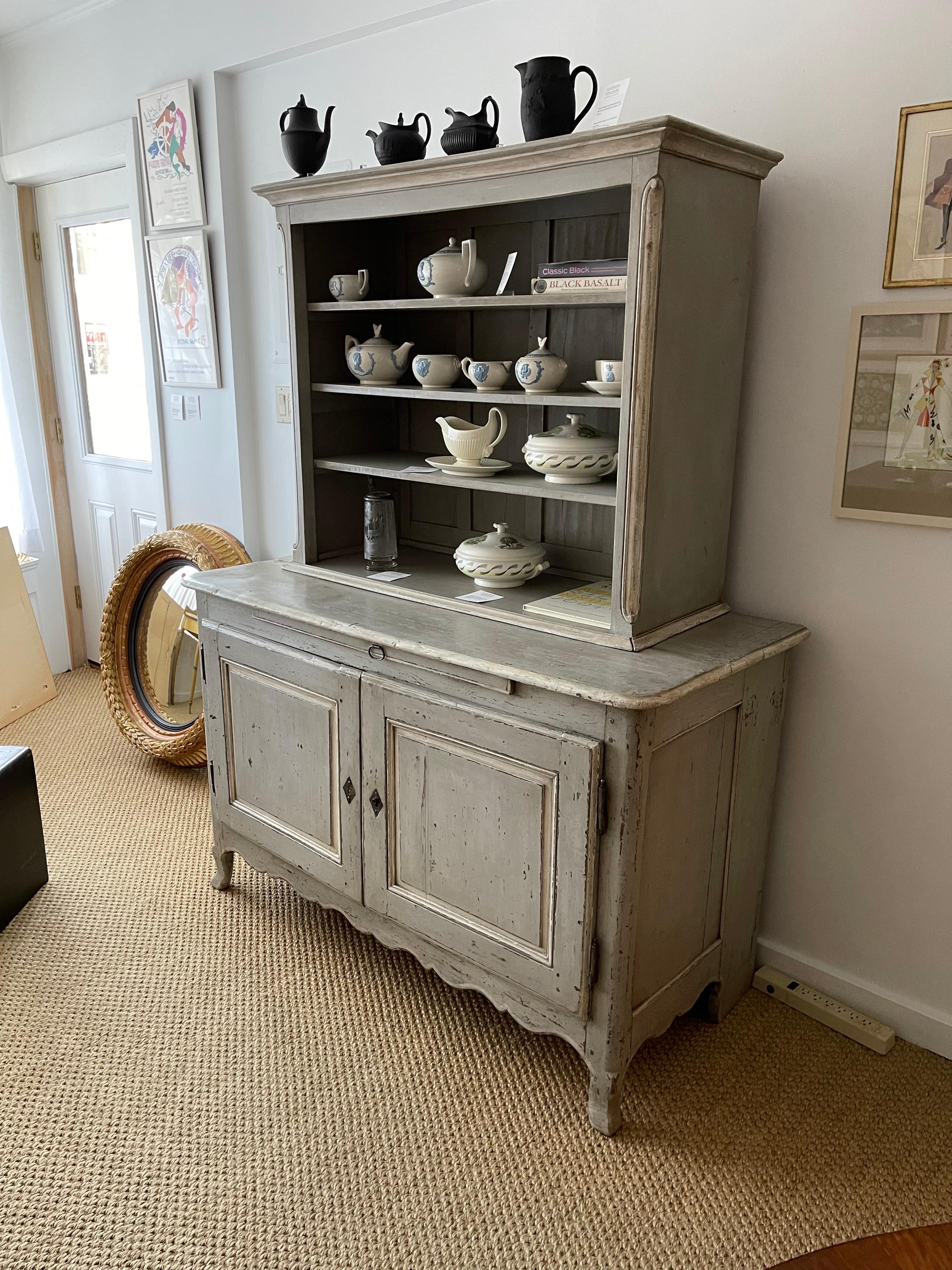 A very functional and attractive 19th century French Louis XV style grey and white painted two-part cabinet, a buffet a deux corps, great as a bar, china or linen cupboard, the removable upper shelving section over a two door cabinet with an