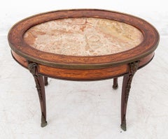 Table basse en bois de roi et marbre de style Louis XV
