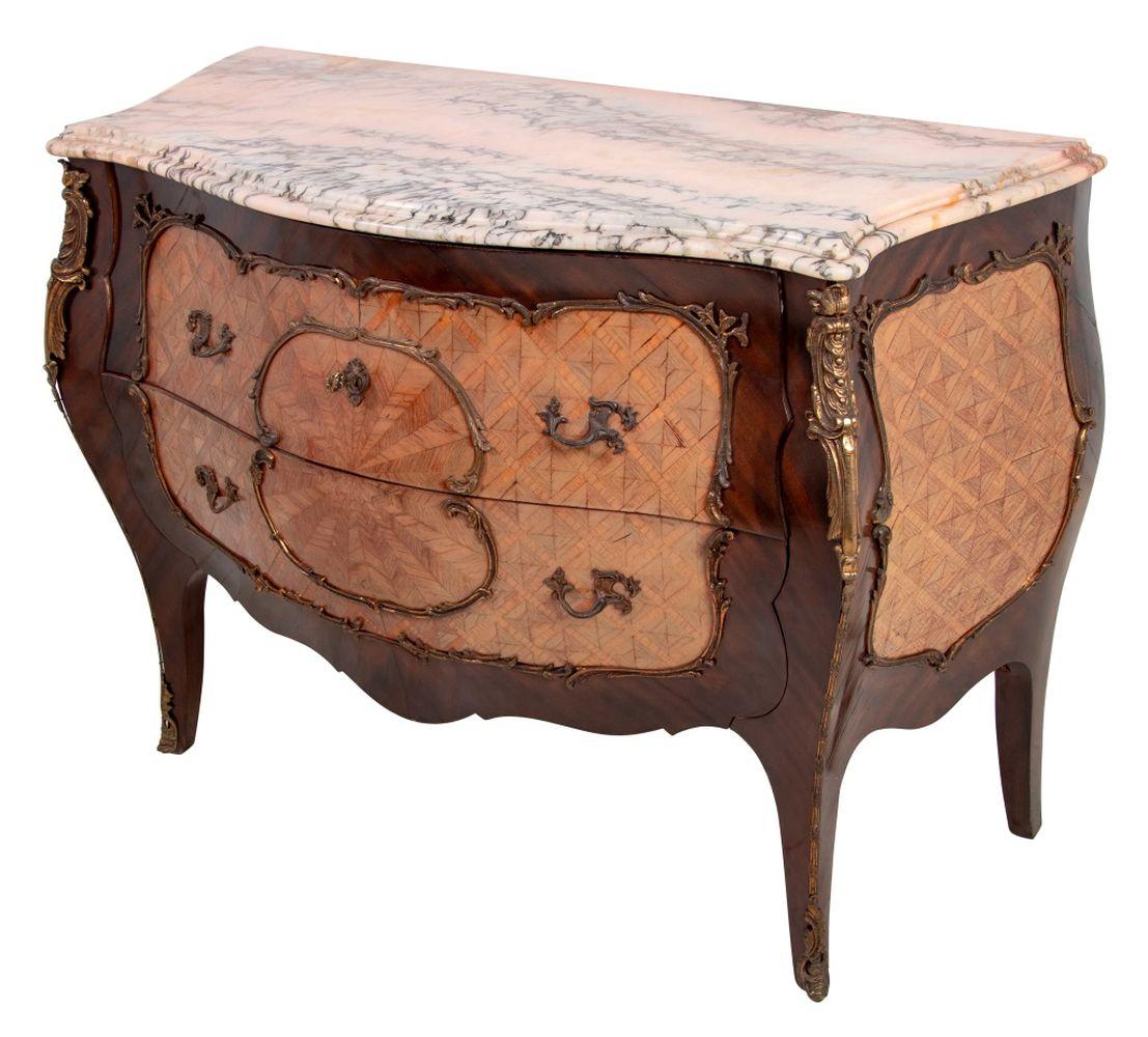 Louis XV Style Gilt Metal Mounted Kingwood Parquetry Marble Top Bombe Commode, 20th century, the molded pink and grey serpentine marble top above two drawers, on cabriole legs and sabot feet. 33