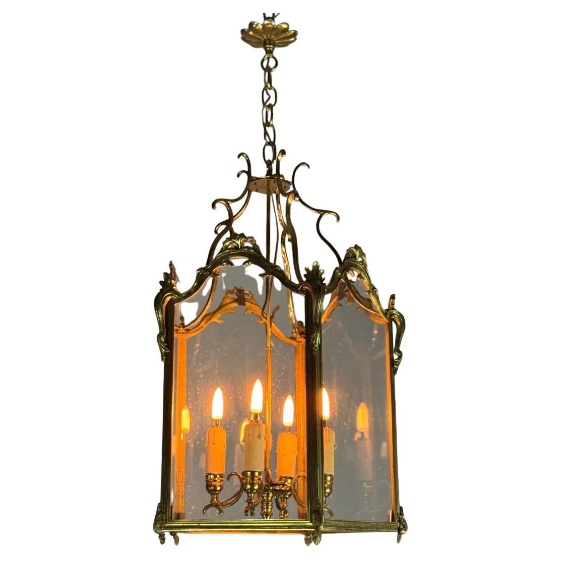 Louis XV style lantern in gilded bronze, circa 1920 For Sale