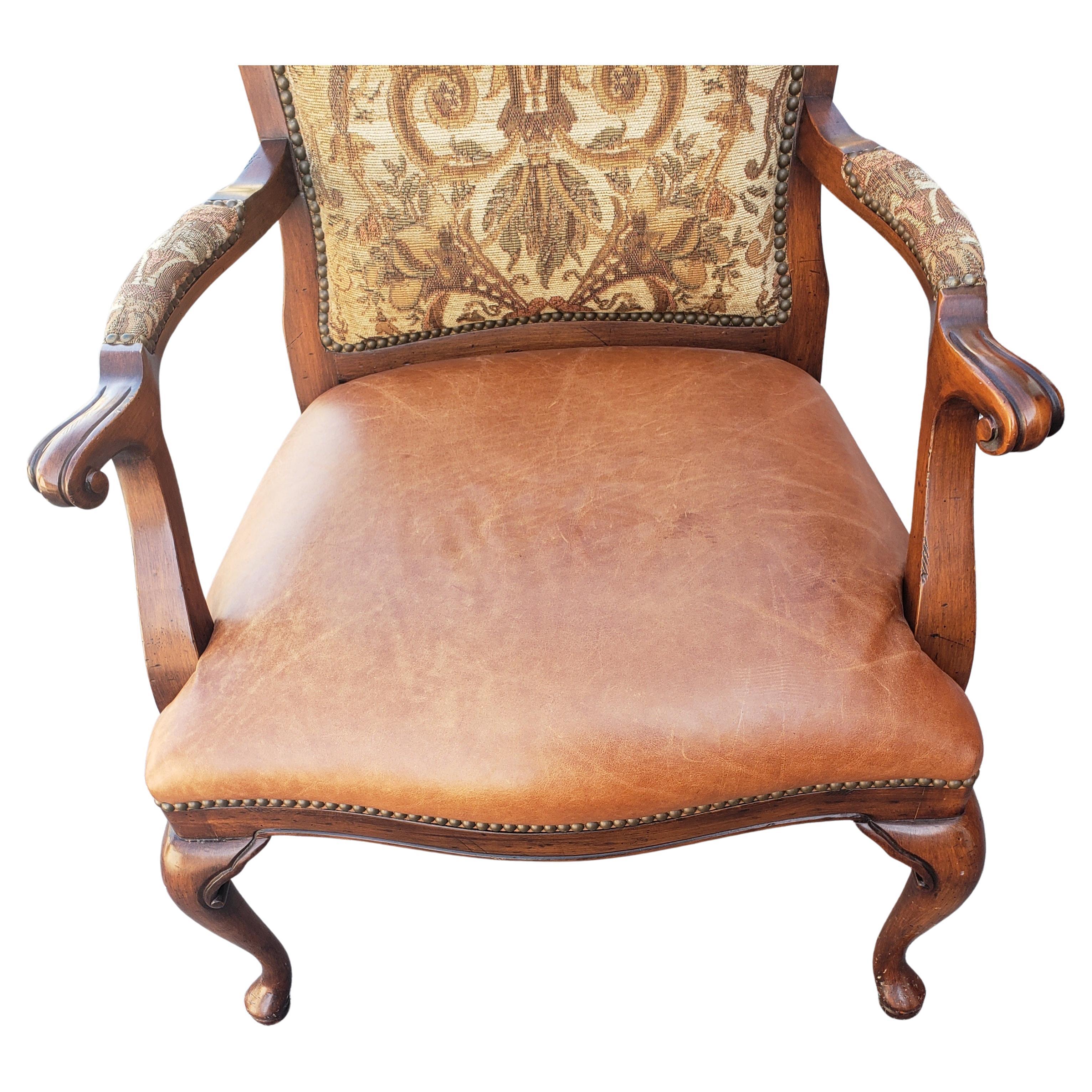 A beautiful pair of Louis XV style French Bergère Chairs with full grain leather seats, Upholstered back and nail trims. all in solid fruitwood frame and back support. Good vintage condition. Measure 29 inches in width, 29 inches in depth and stand