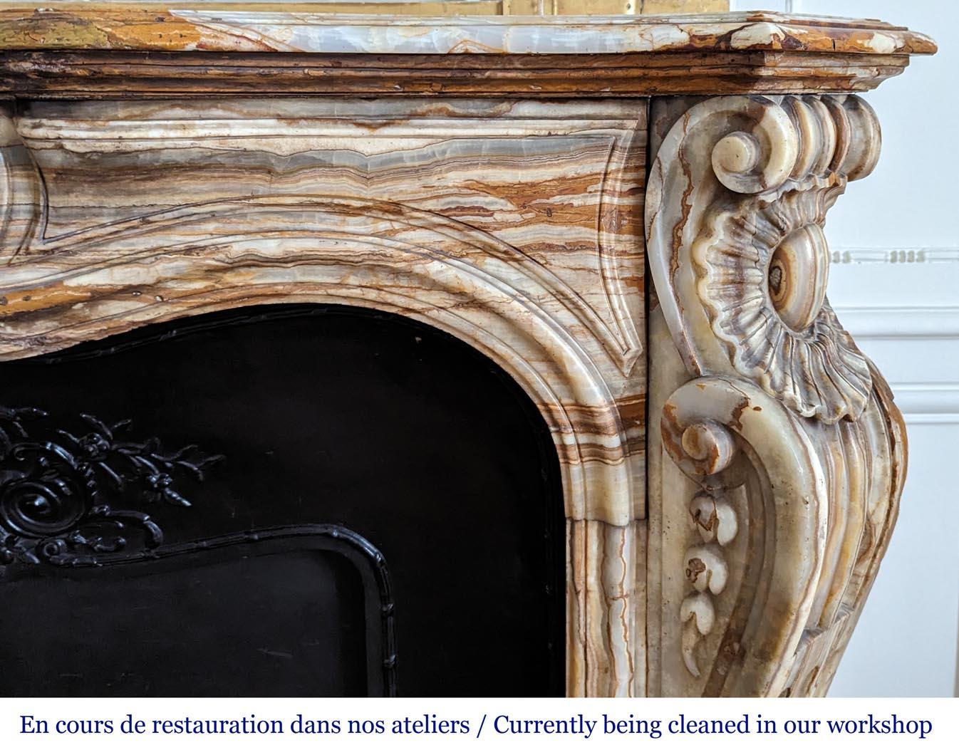 Onyx Louis XV style mantel in onyx For Sale