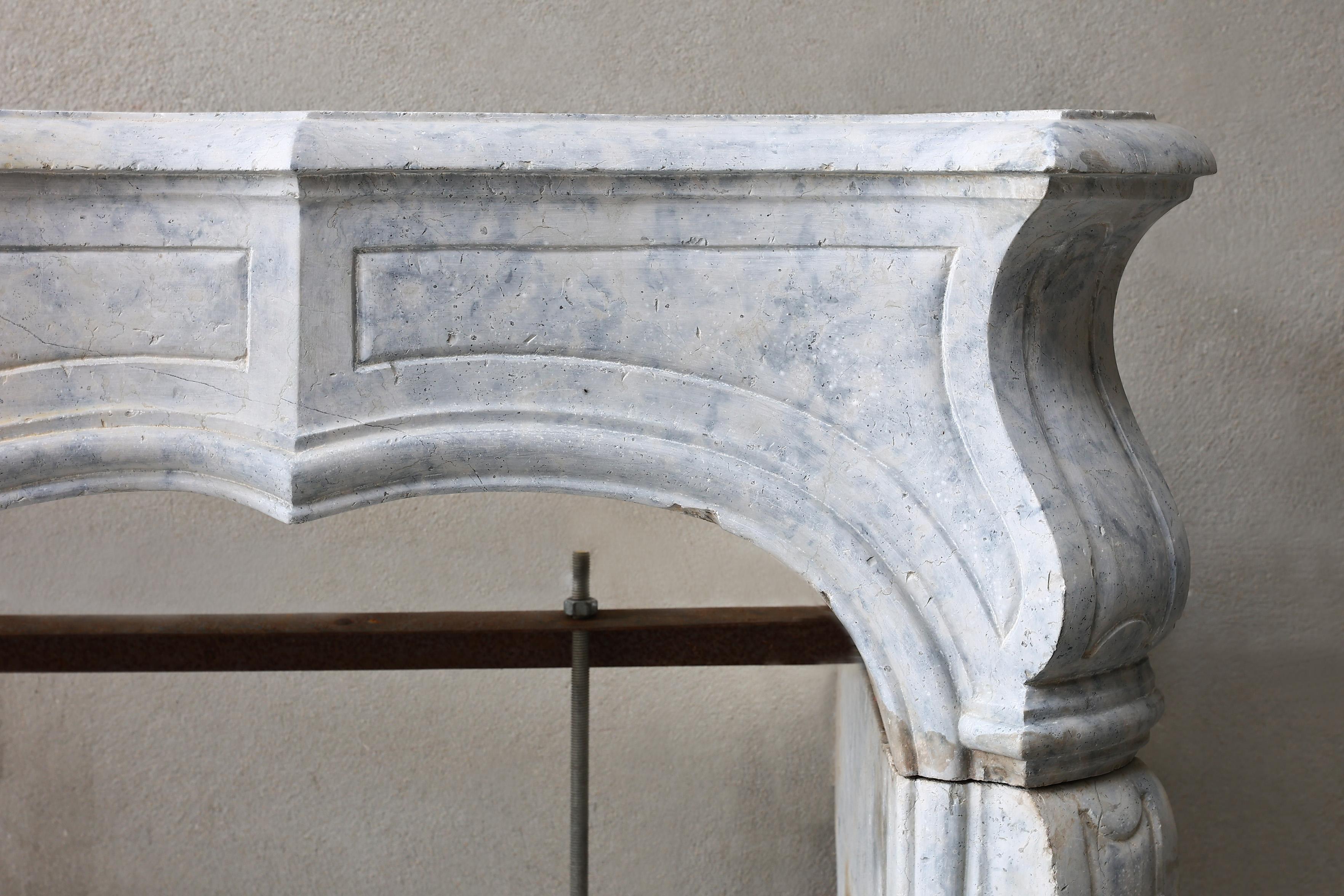 French Louis XV Style Mantle Surround of Solid Marble from the 19th Century For Sale