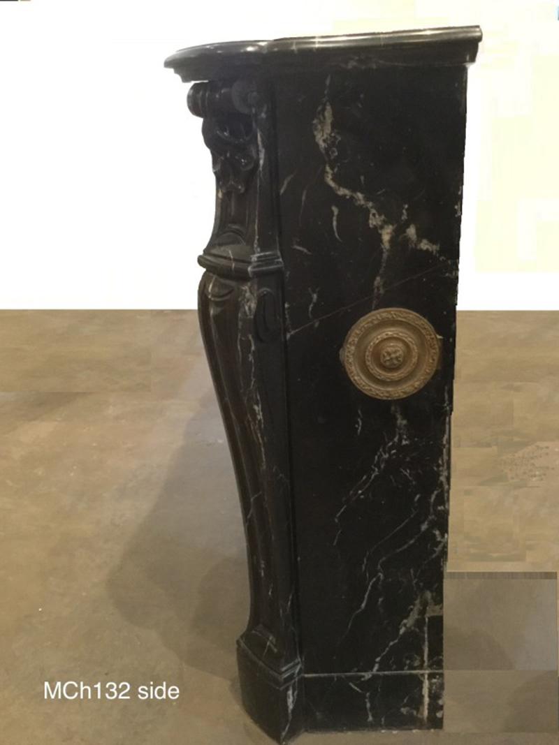 Louis XV Style Marble Mantle with “Trois Rocaille” Carving In Good Condition In Dallas, TX