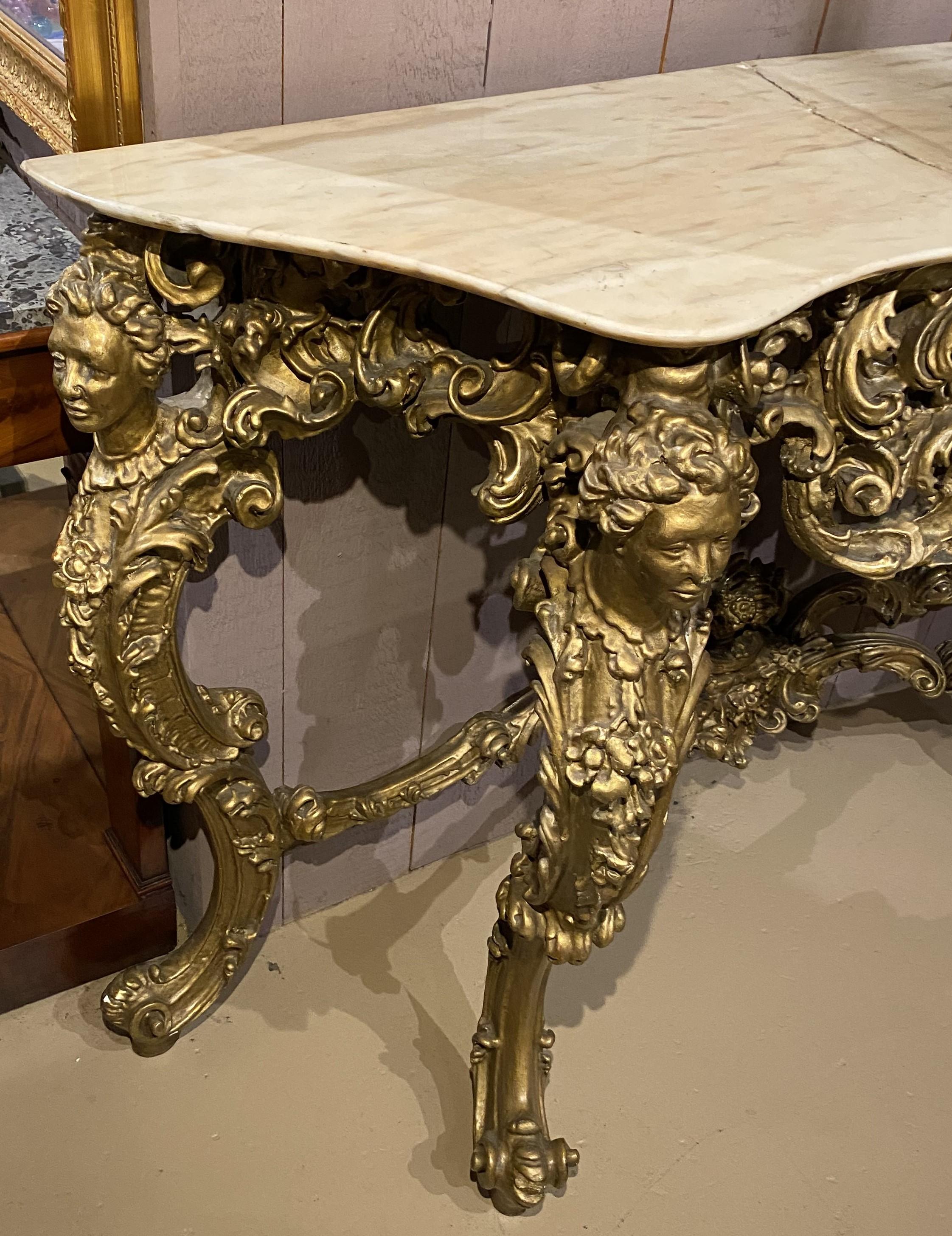 French Louis XV Style Marble Top Carved Giltwood Console w/ Cherub & Figural Decoration For Sale