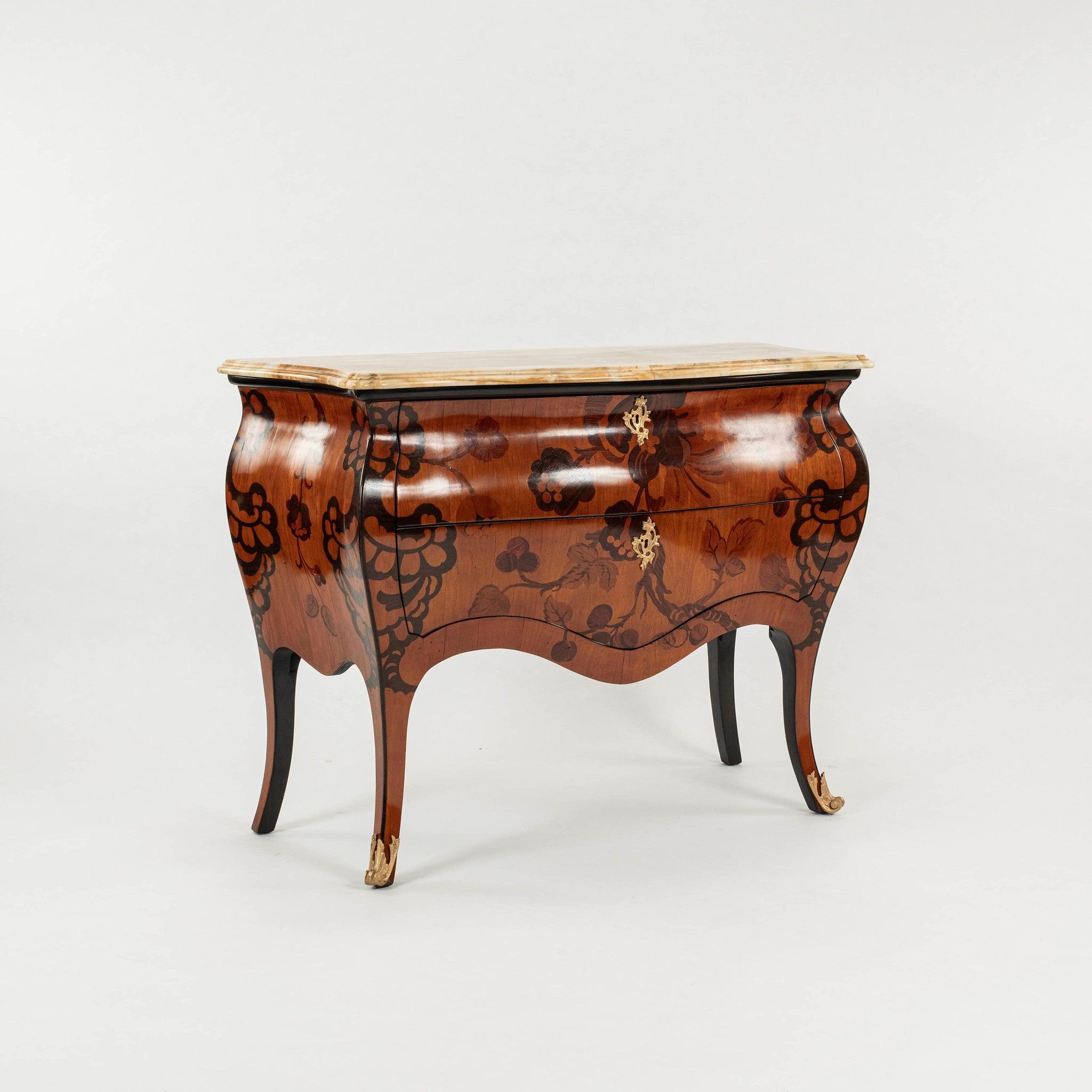 20th Century Louis XV style rococo marquetry bombe commode with Sienna Marble top, floral and leaf marquetry, gilt bronze ormolu, two drawers and keys.