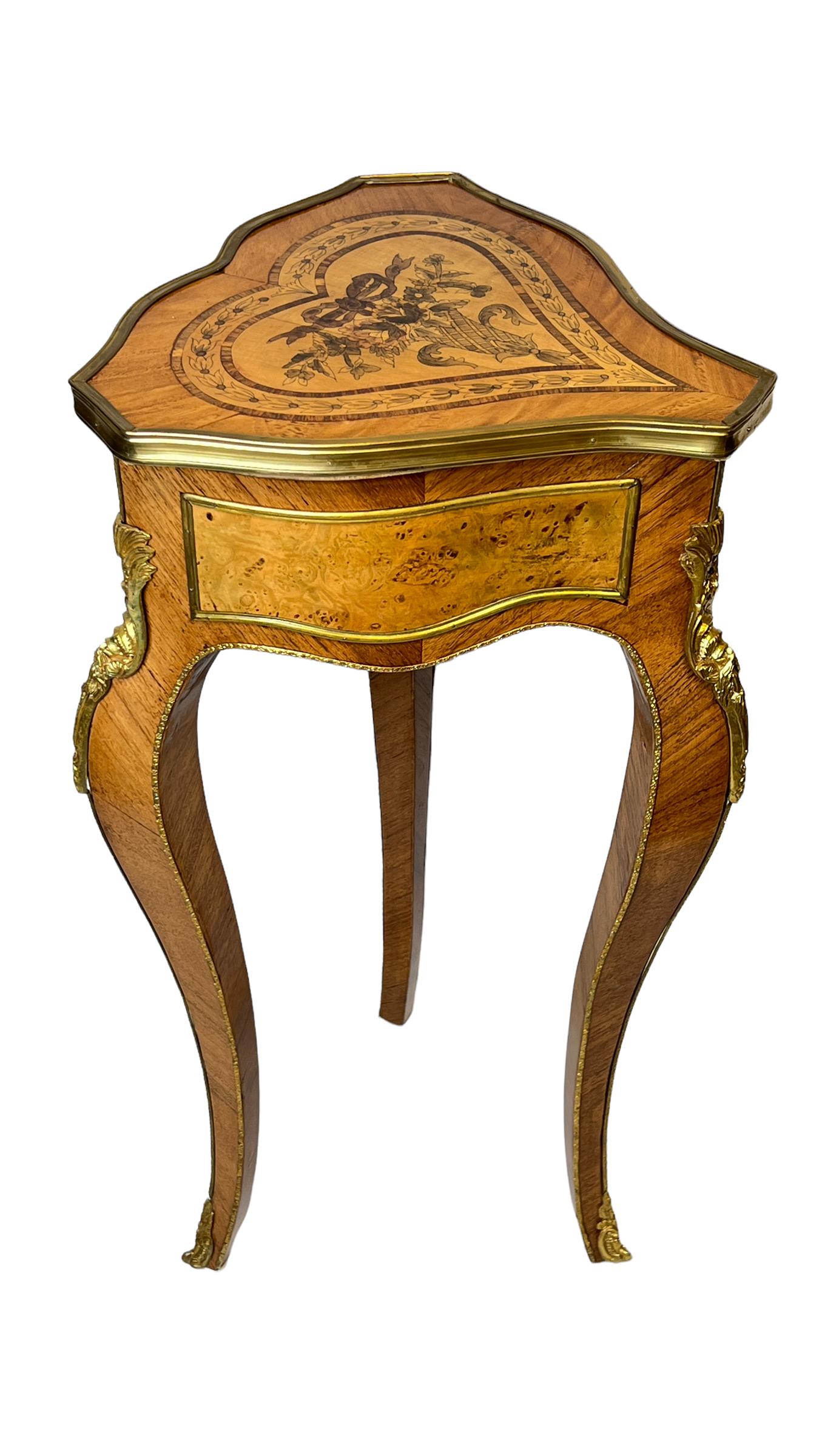 Louis XV Style Marquetry Inlaid Tripod side table with gilt bronze mounts.