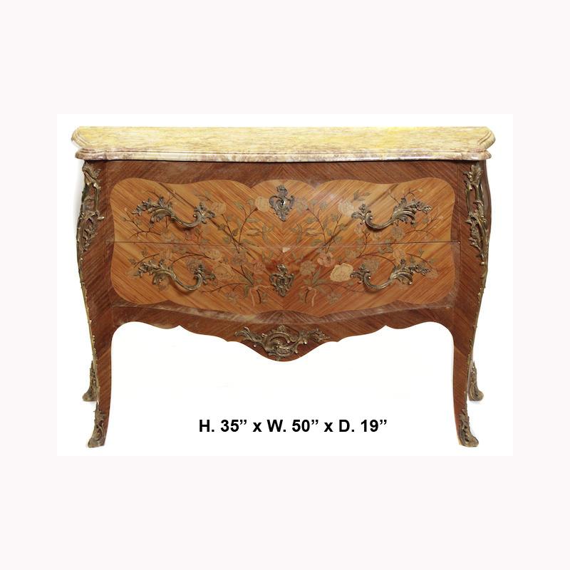 Elegant late 19 century French Louis XV style gilt bronze mounted floral colored marquetry kingwood commode with marble top.
A moulded beige serpentine-fronted marble top is over two long drawers, the front and the sides are beautifully inlaid in