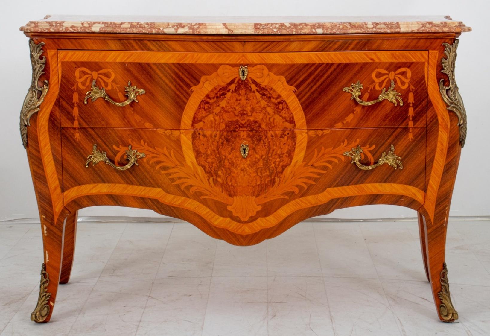 Louis XV Style Marquetry Two Drawer Commode, with shaped serpentine Peach Breccia top above bombe form commode with giltmetal mounts and floral marquetry.

Dimensions:   32