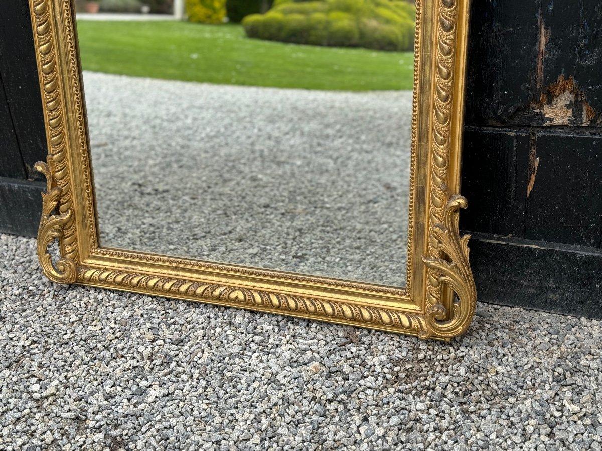 Louis XV style mirror in carved, stuccoed and gilded wood circa 1880