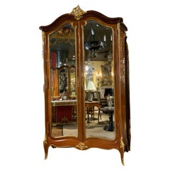 Louis XV Style  mirrored Armoire with bronze dore mounts