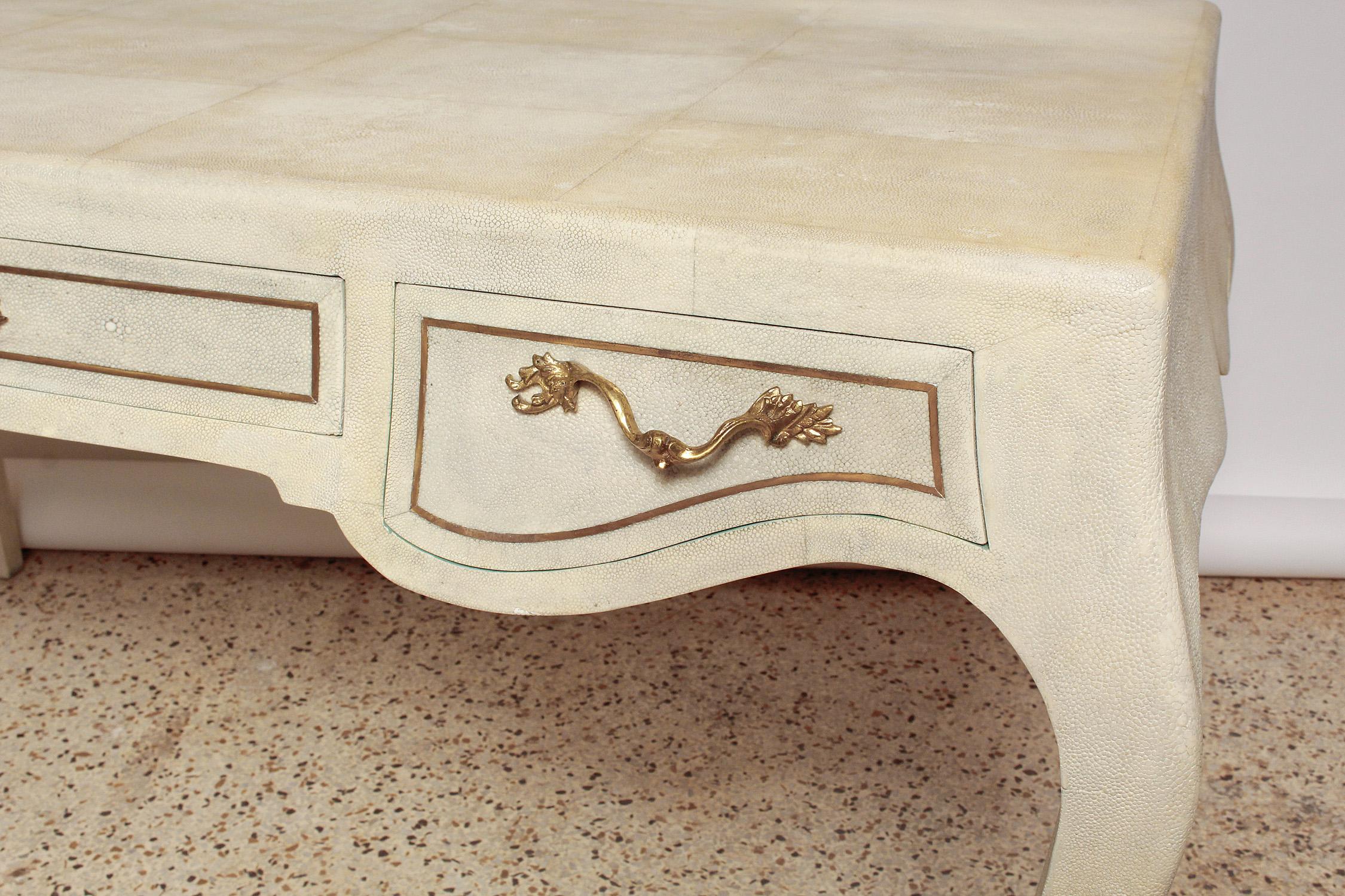 Gorgeous Louis XV style desk by Maitland Smith in cream and grey natural shagreen with delicate cabriole legs and solid brass hardware and inlays, circa 1985. 
Be a home office Boss!