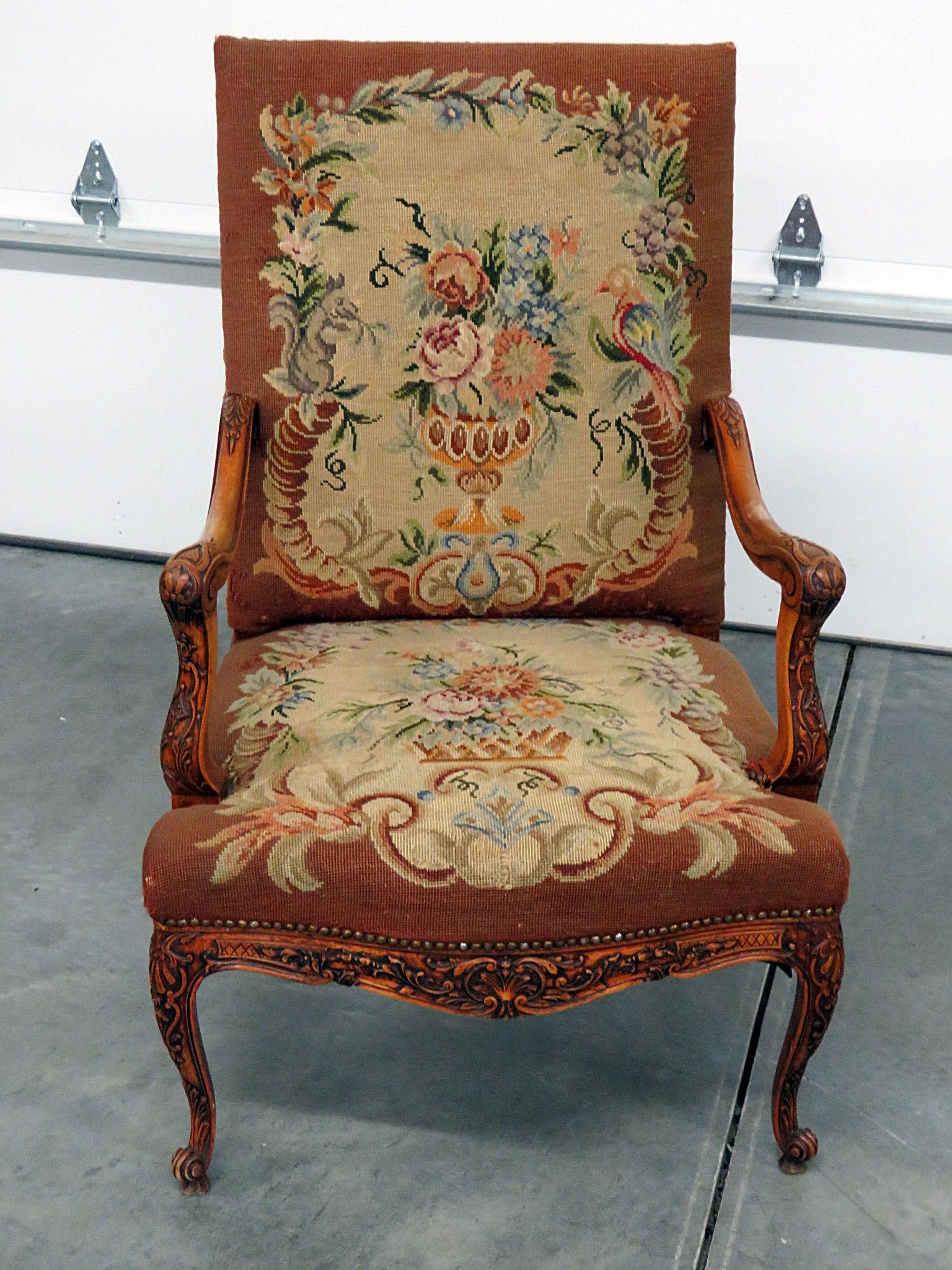 Louis XV style needlepoint armchair with nailhead trim.