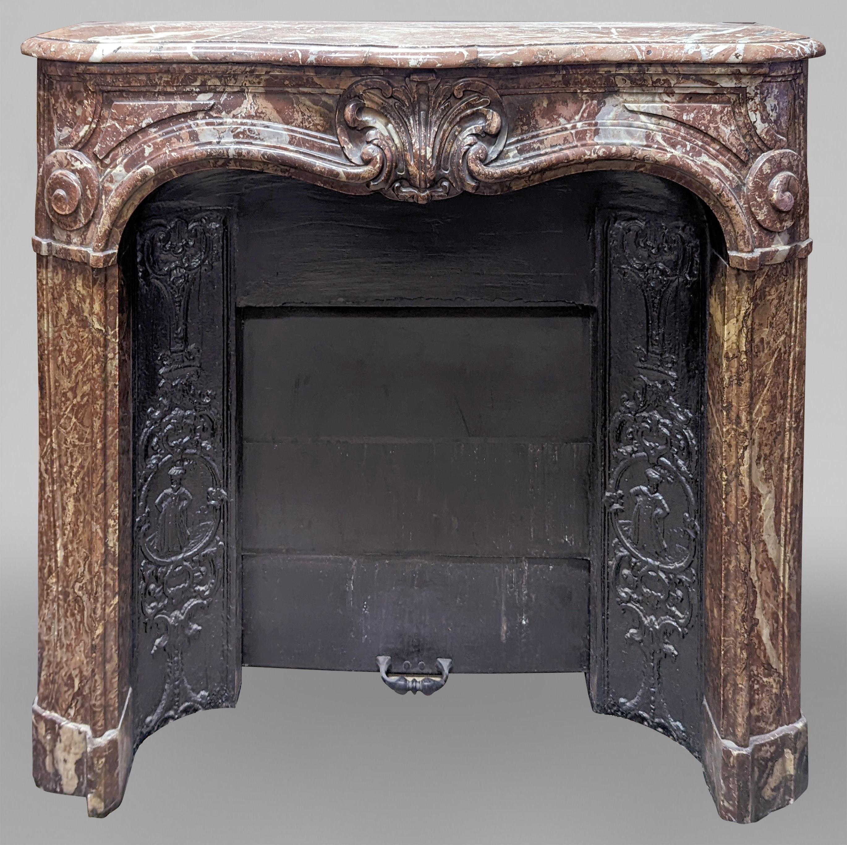 Oak Louis XV style oak paneling and bookcase including a fireplace mantel. For Sale